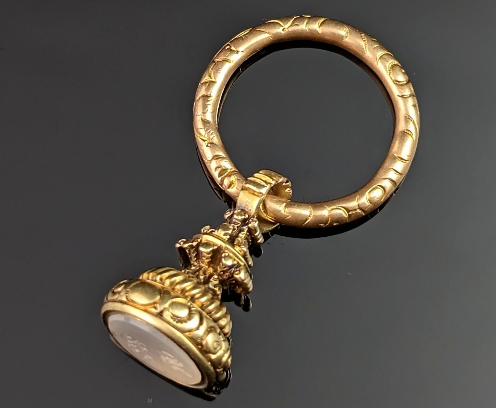 We can't get enough of this charming and alluring Georgian gold seal fob and split ring pendant.

I'm sure you will agree that there is just a certain type of magic that exudes from Georgian pieces, the rich materials, impeccable craftsmanship and