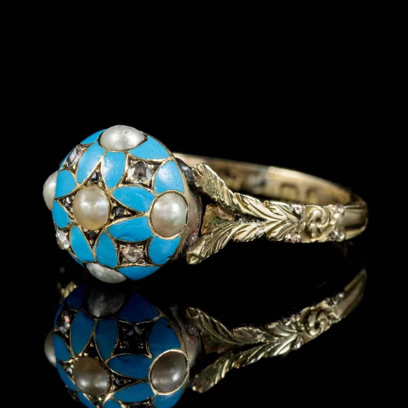 This fabulous antique Georgian Blue Enamel forget me not ring is fully hallmarked and dated London, 1801.

The pretty face displays four gorgeous duck egg blue Enamel forget me nots crowned with Pearls and twinkling Diamonds.

‘Forget-me-not, O