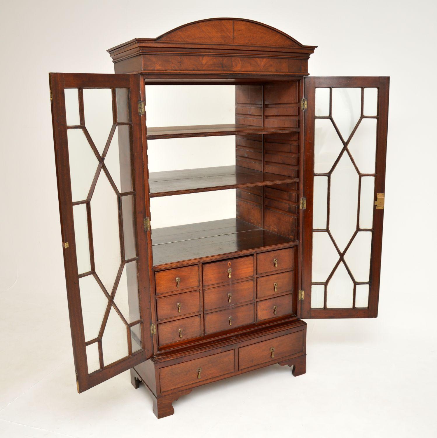 A small proportioned beautiful and unusual antique Georgian bookcase. This was made in England, it dates from around the 1790 period.

It has an interesting and useful design, and is of superb quality. This is of fairly small proportions, the two