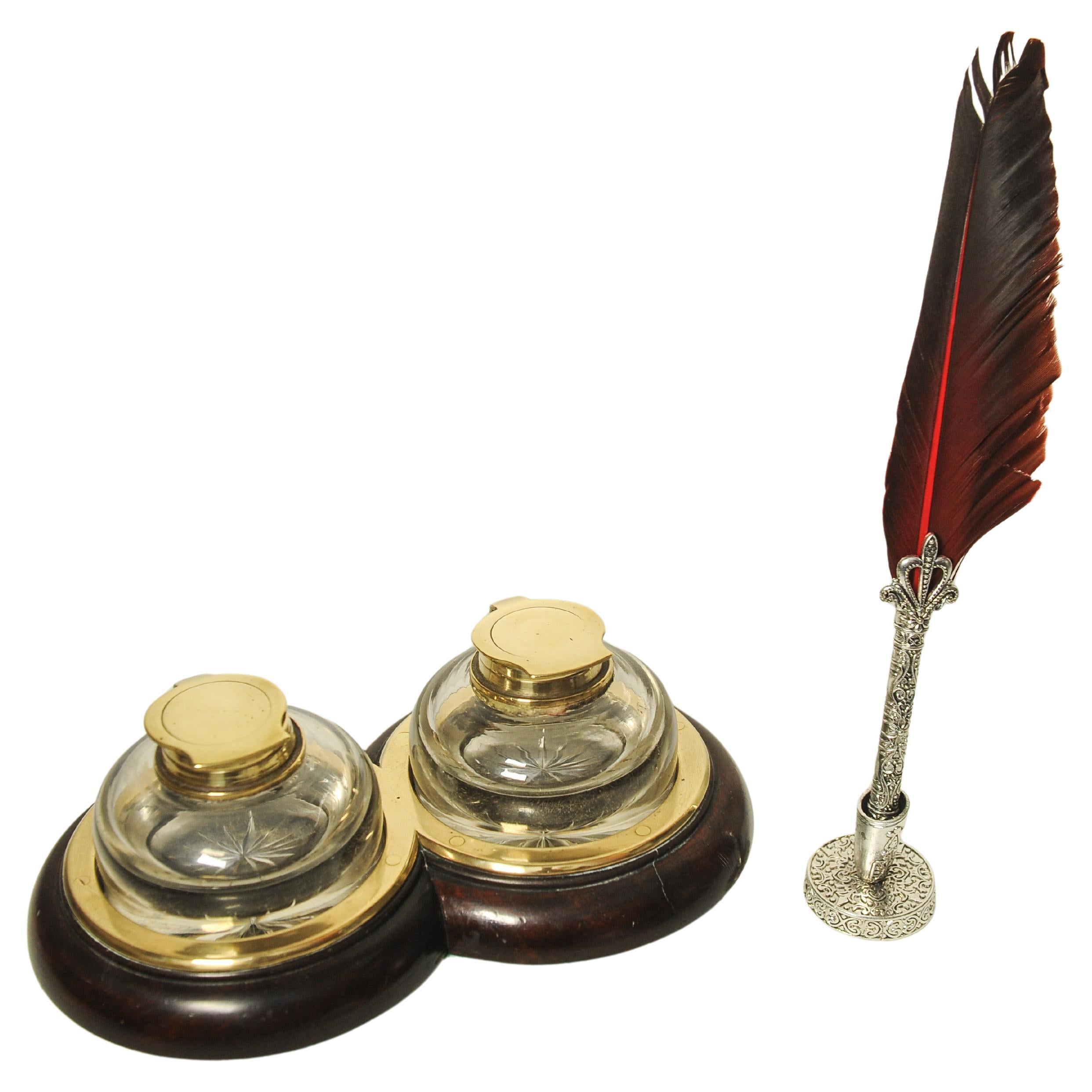 Rare Set of 19th Century Antique Georgian Mahogany & Brass Mounted Double Inkwell Stand With Original Handblown Glass Inkwells Brass Topped Inkwells With Hinged Brass Collar Mounts & Star Cut Bases

The Inkwells Form A Very Attractive Figure Of