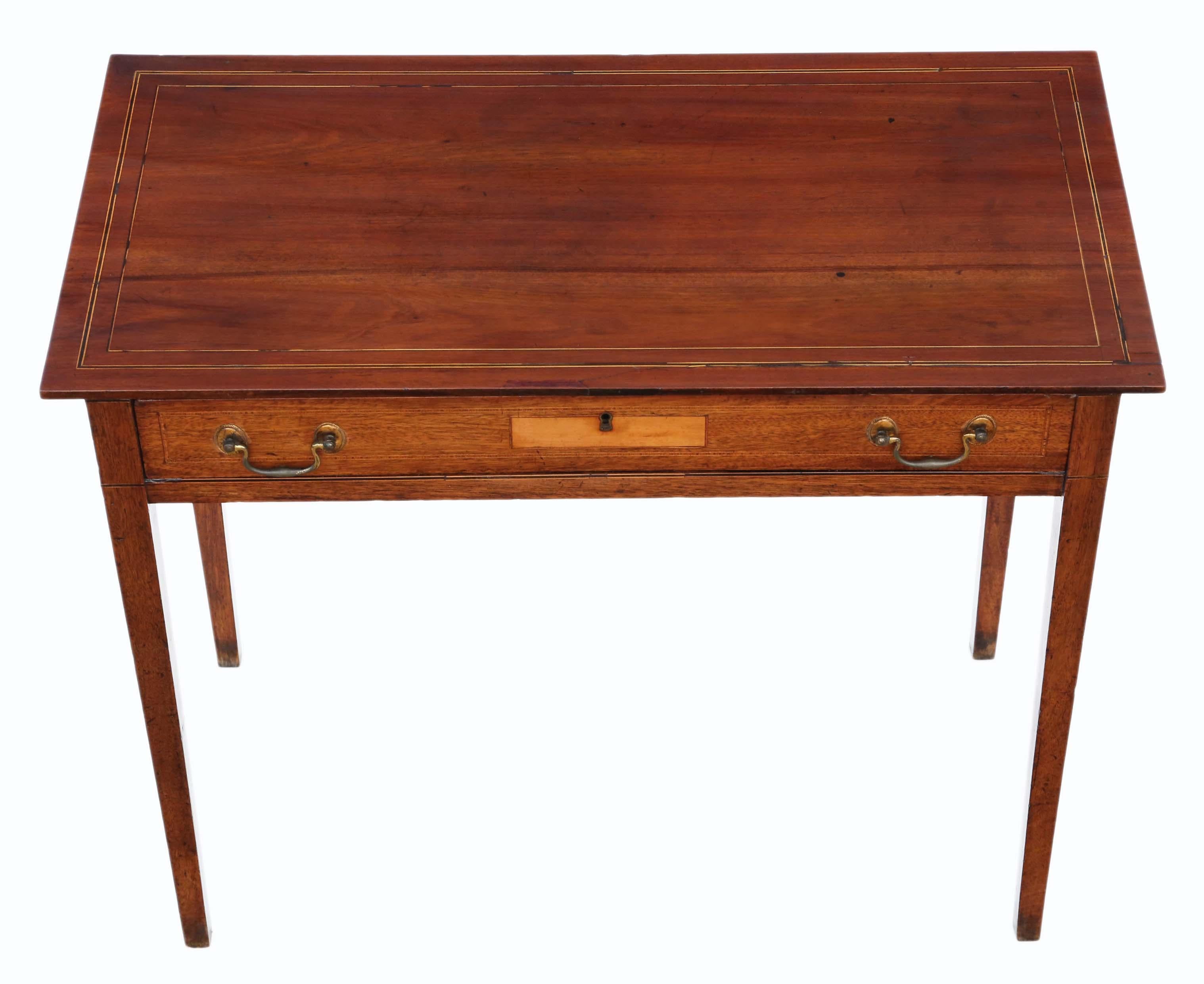 Antique Georgian circa 1800 inlaid mahogany writing side table desk.

No loose joints and no woodworm. Full of age, character and charm. The drawer slides freely.

Would look great in the right location! A charming, characterful
