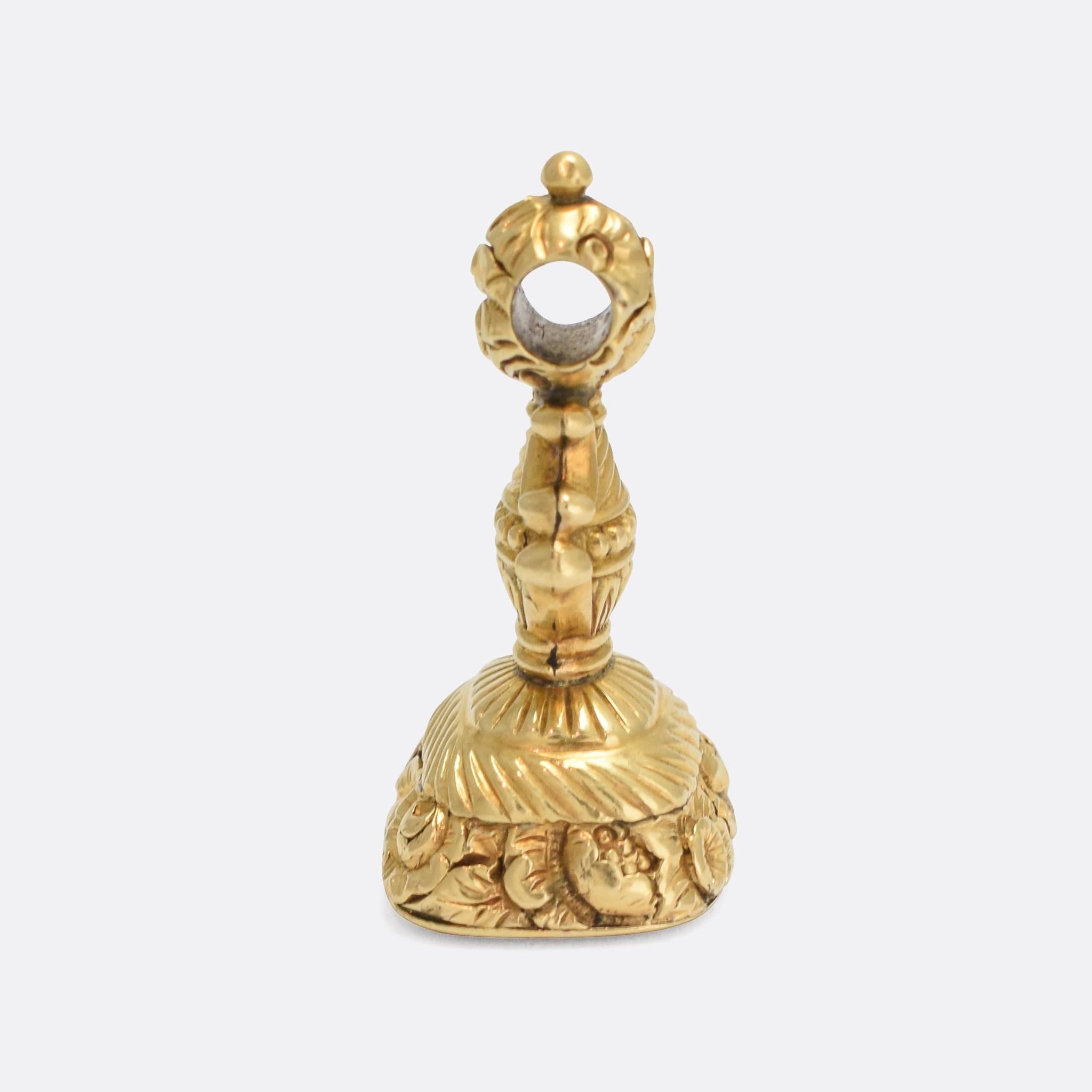 A fine quality 18th Century seal fob, a good substantial size and modelled in 15k gold. The base is set with an uncarved carnelian panel, and the fob itself is deeply chased with orange blossom and other foliate detailing. It would have originally