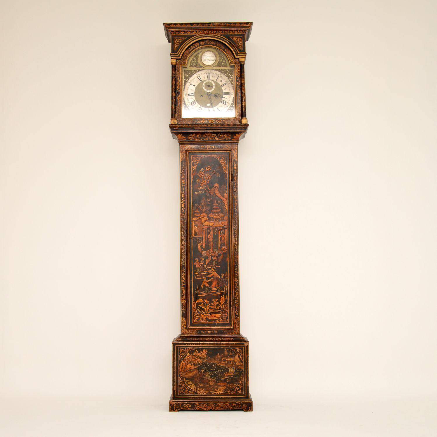 Antique Georgian chinoiserie grandfather clock with a brass and silvered dial by Jon Grindon of St Albans. It has an 8 day movement which is in working condition at the moment in our warehouse. It has quite unusual shaped weights, like bottles. The