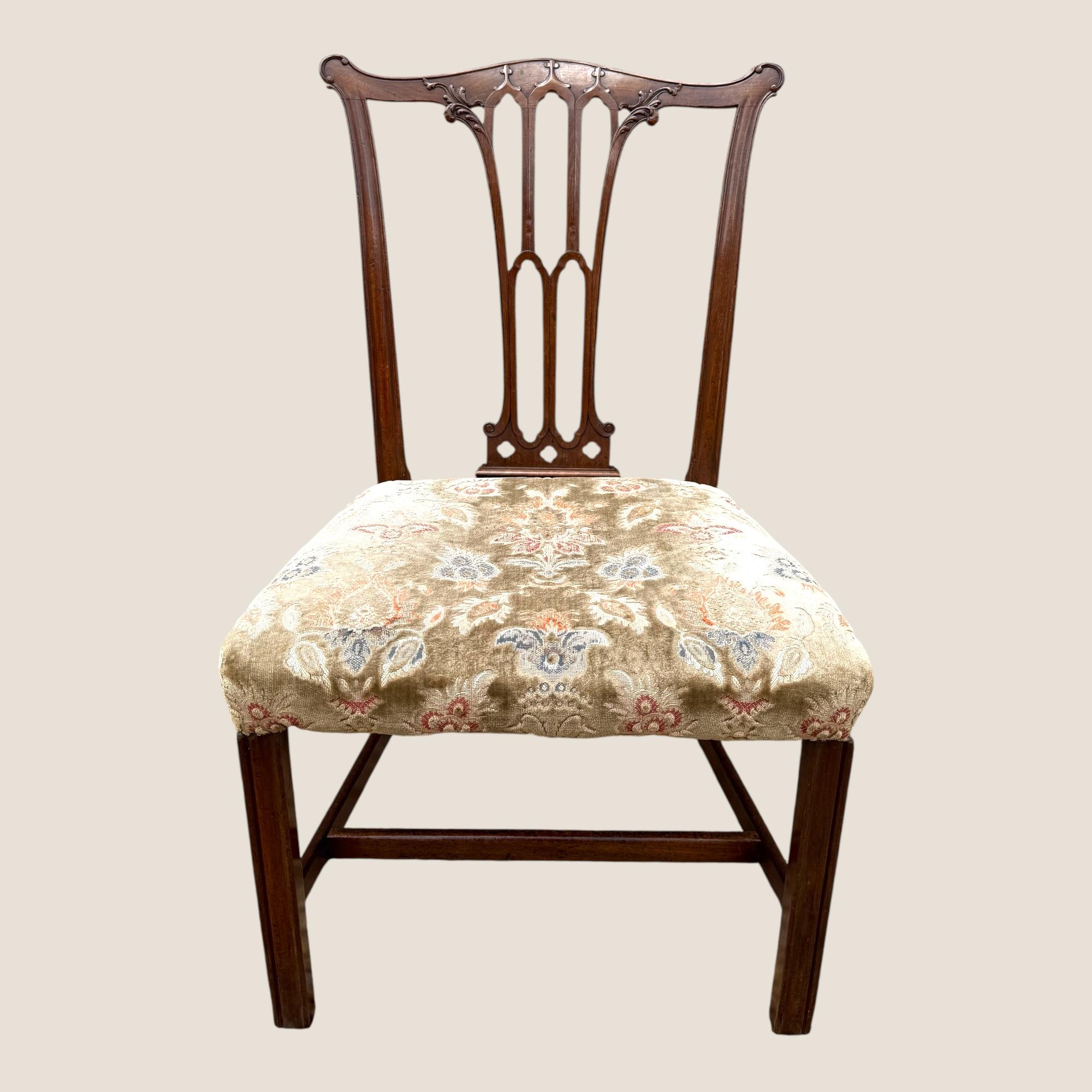 Here we have an Antique Georgian Chippendale Period, circa 1760, Mahogany & Floral Upholstered Single Carved Chair. The back splat features gothic carvings, the upholstered chair seat is a light faded green colour with floral designs. The base