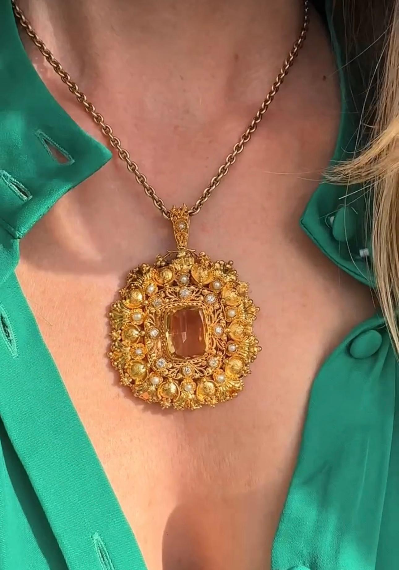 Meticulously hand fabricated in high karat gold, this Georgian-era jewel features an enchanting 6 carat citrine framed in fine cannetille and granulation work, punctuated with tiny lustrous pearls and twinkling old mine-cut diamonds. 

 

Citrine:
