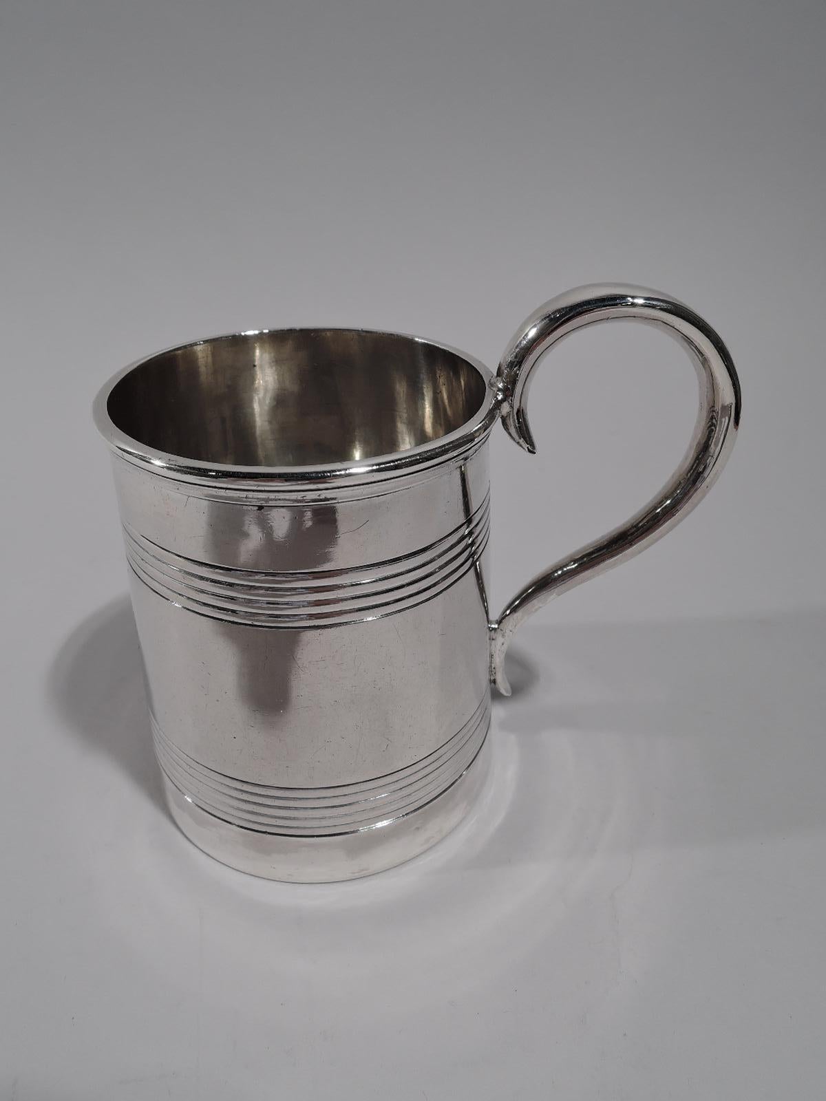 Traditional coin silver baby cup. Made by George Sharp for Bailey & Co. in Philadelphia. Straight and upward tapering sides with reeded bands and high-looping handle. A popular Georgian form that remained in production for many years. Sharp worked