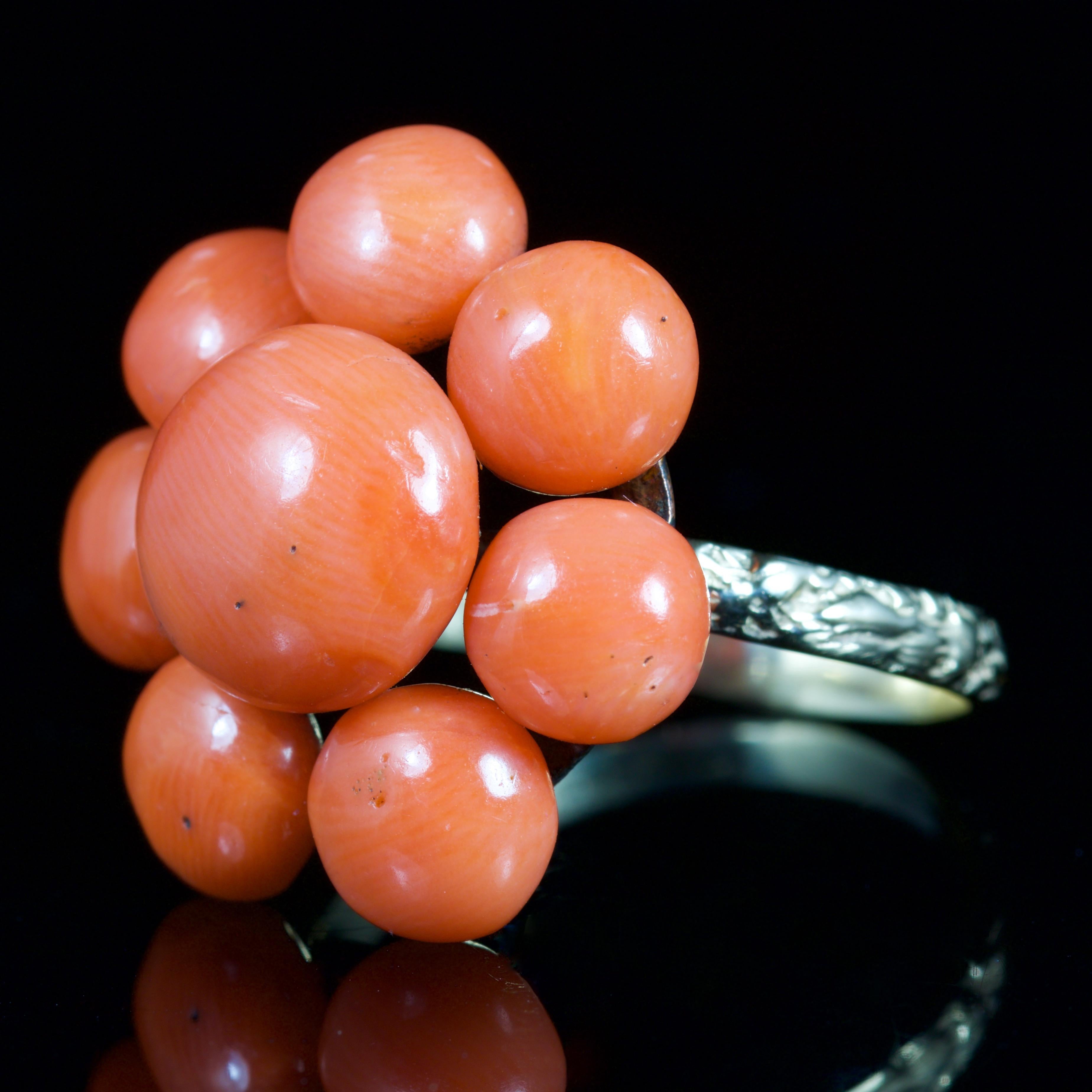 This beautiful Georgian 18ct Gold Coral cluster ring is Circa 1800.

Due to its age, Georgian jewellery is quite rare, with some pieces almost three hundred years old. From 1714 until 1837 four King Georges and a short-lived William gave rise to
