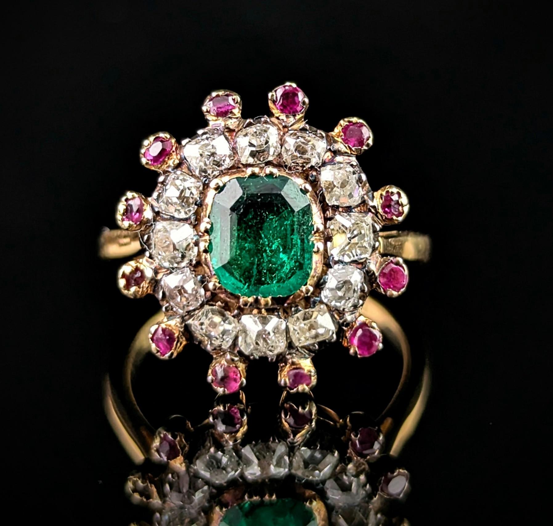 Now this is a true showstopper of antique ring if you ever did see one!

Late Georgian era this magical beauty features an almost starburst like cluster design, the centre housing a rich deep green emerald in a collet set closed back setting