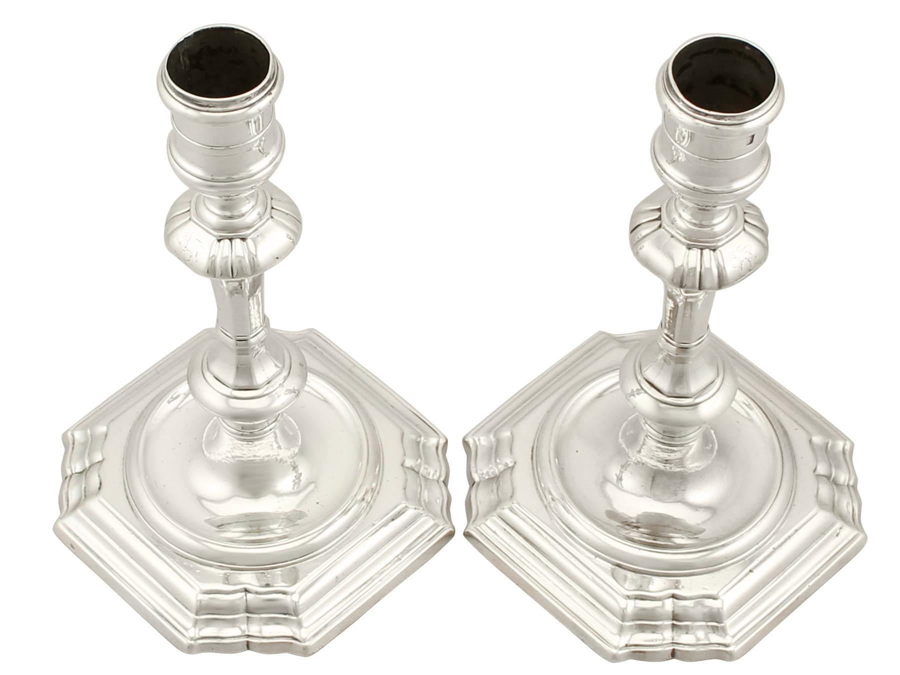 An exceptional, fine and impressive pair of antique George II English cast sterling silver candlesticks; an addition of our ornamental Georgian silverware collection

These exceptional antique George II cast sterling silver candlesticks have a