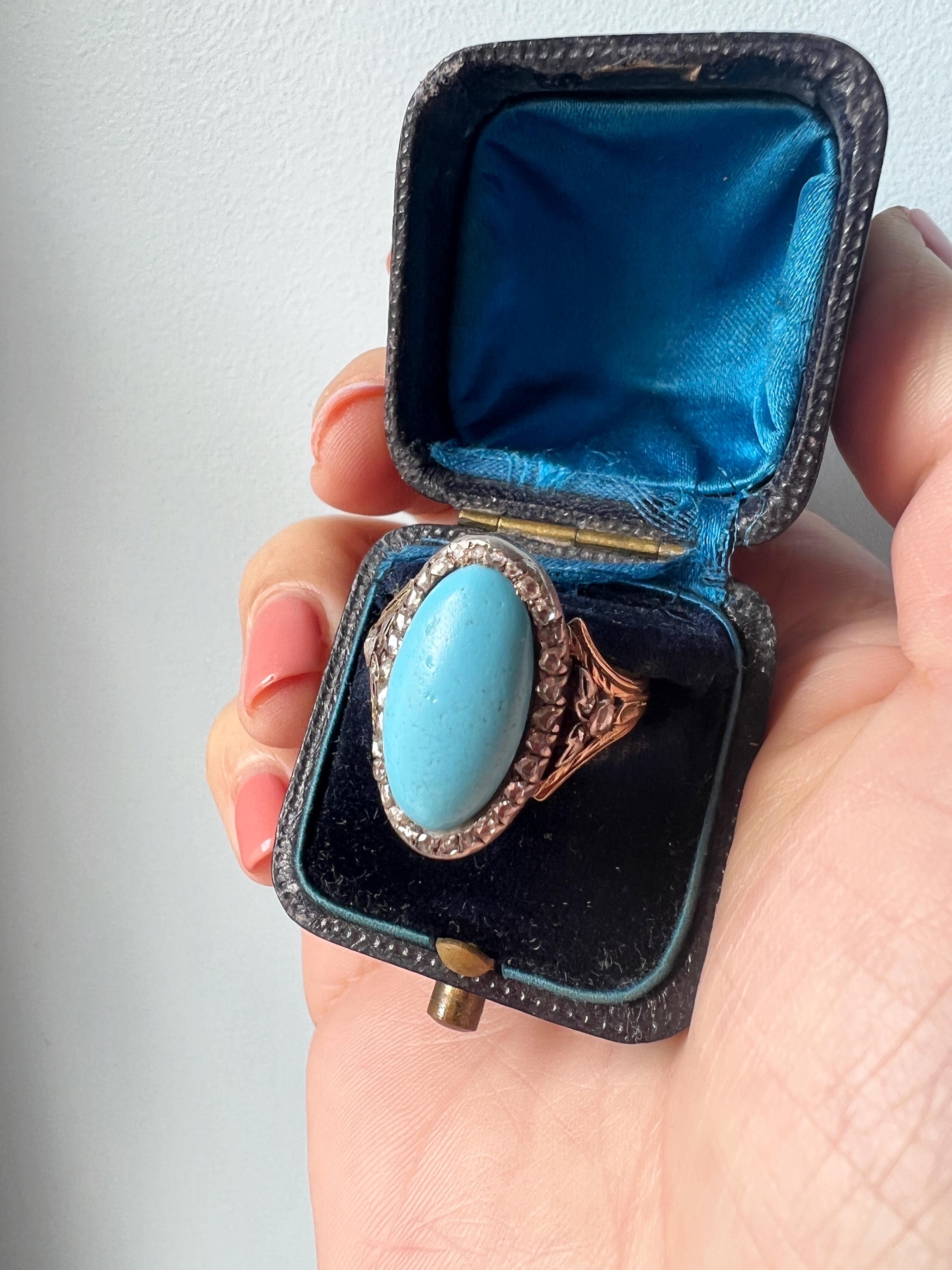 For sale a fabulous & very rare 18k statement ring featuring a beautiful blue pâte de verre in the center, surrounded by sparkling rose cut diamonds. The sublime sky blue color is perfectly captured in this fabulous ring. We also adore the shoulder