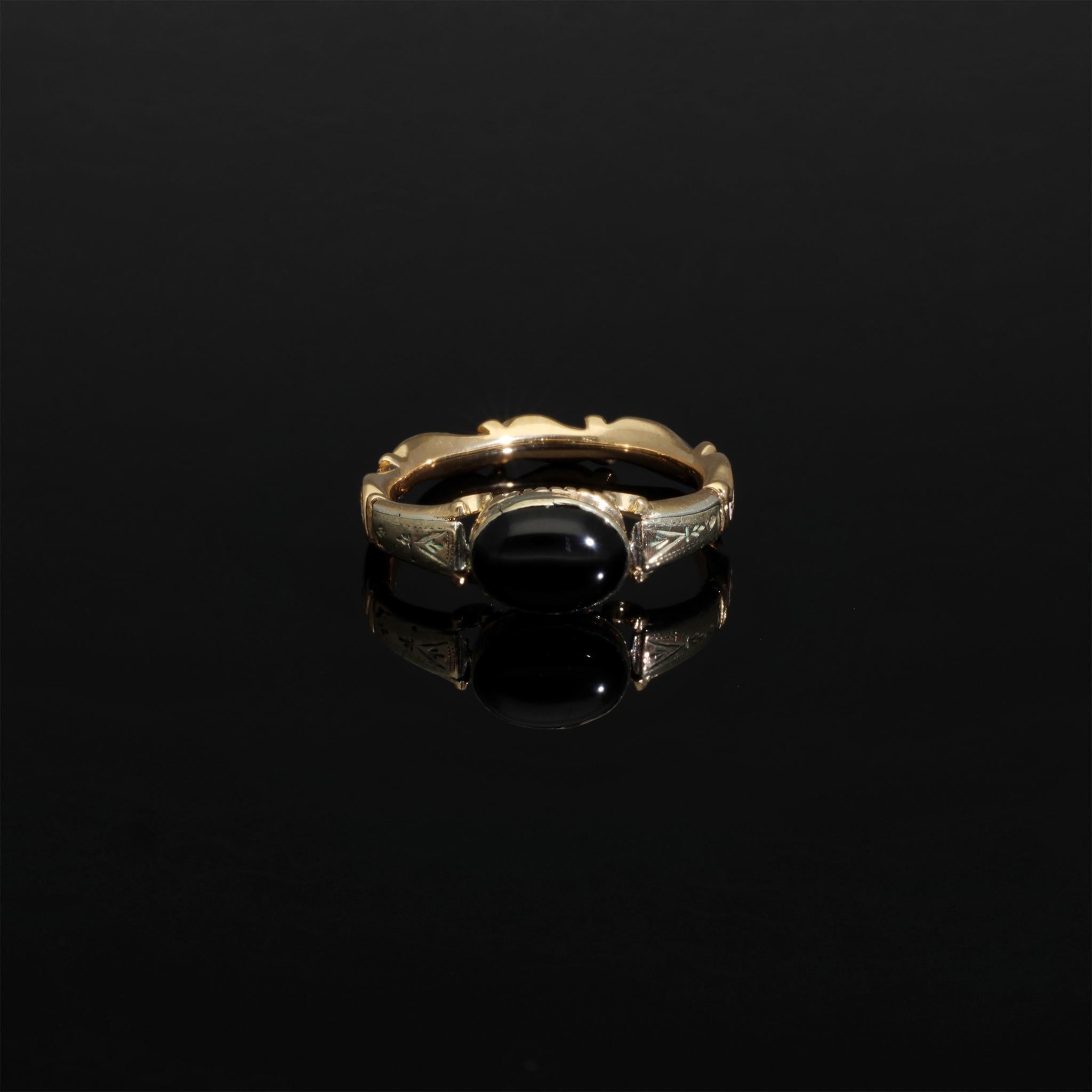 A museum-worthy 255 year old antique mounring ring! Coming from Sweden, this solid 18k gold ring was made to commemorate Will who passed at the age of 40! This antique Georgian era high carat gold ring is set with a black onyx cabochon and adorned