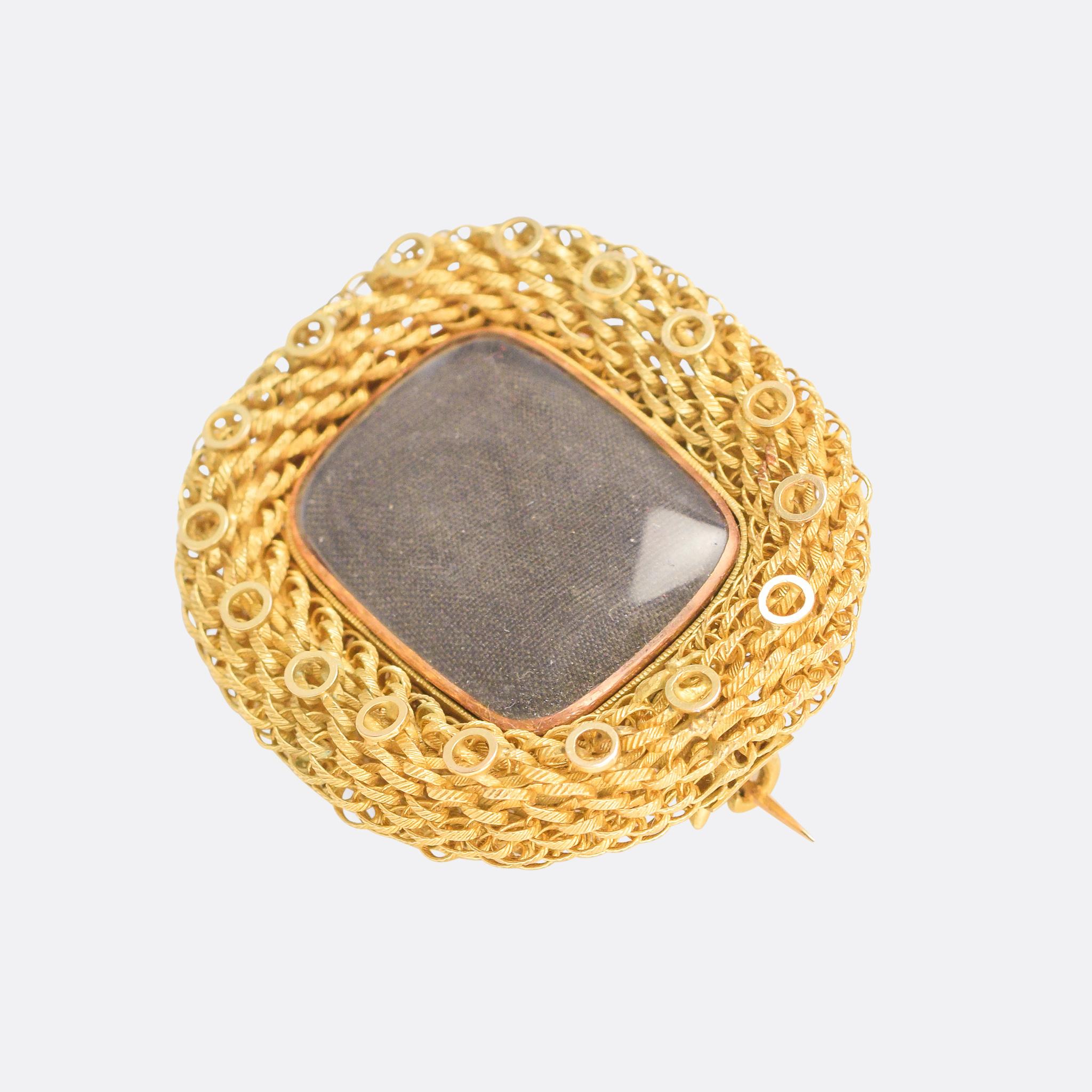 An absolutely stunning Georgian gold wire mesh suite comprising a bracelet and a brooch, the latter with central locket compartment and bail for wear as a pendant. The 15 karat gold has been expertly crafted into textured wire, and then intricately