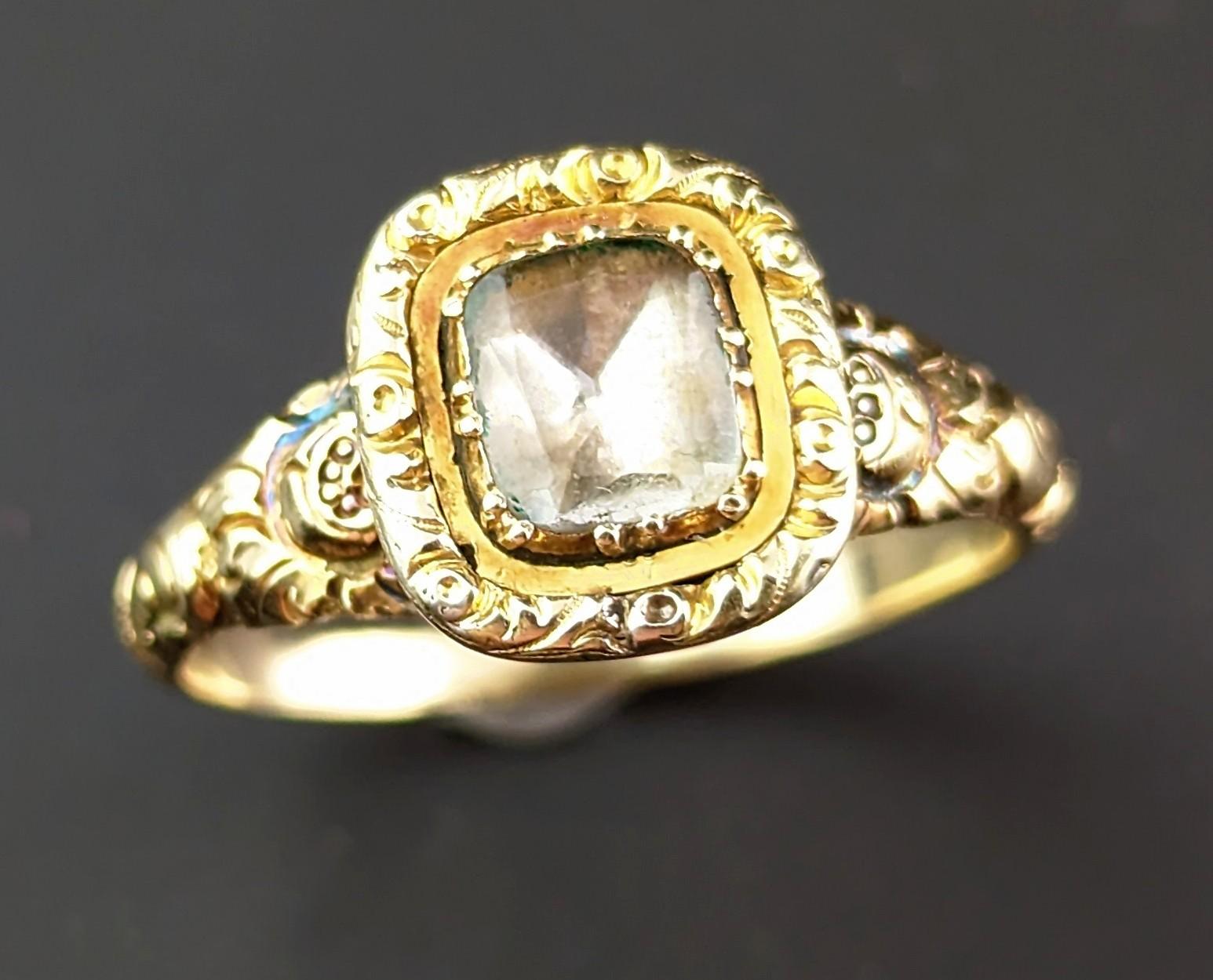 This antique Georgian era foiled Quartz ring is simply enchanting.

It is full of old world charm and mystery, a ring I simply adore for the stories it could tell and it's beautiful Georgian craftsmanship.

It is a rare find as it electronically