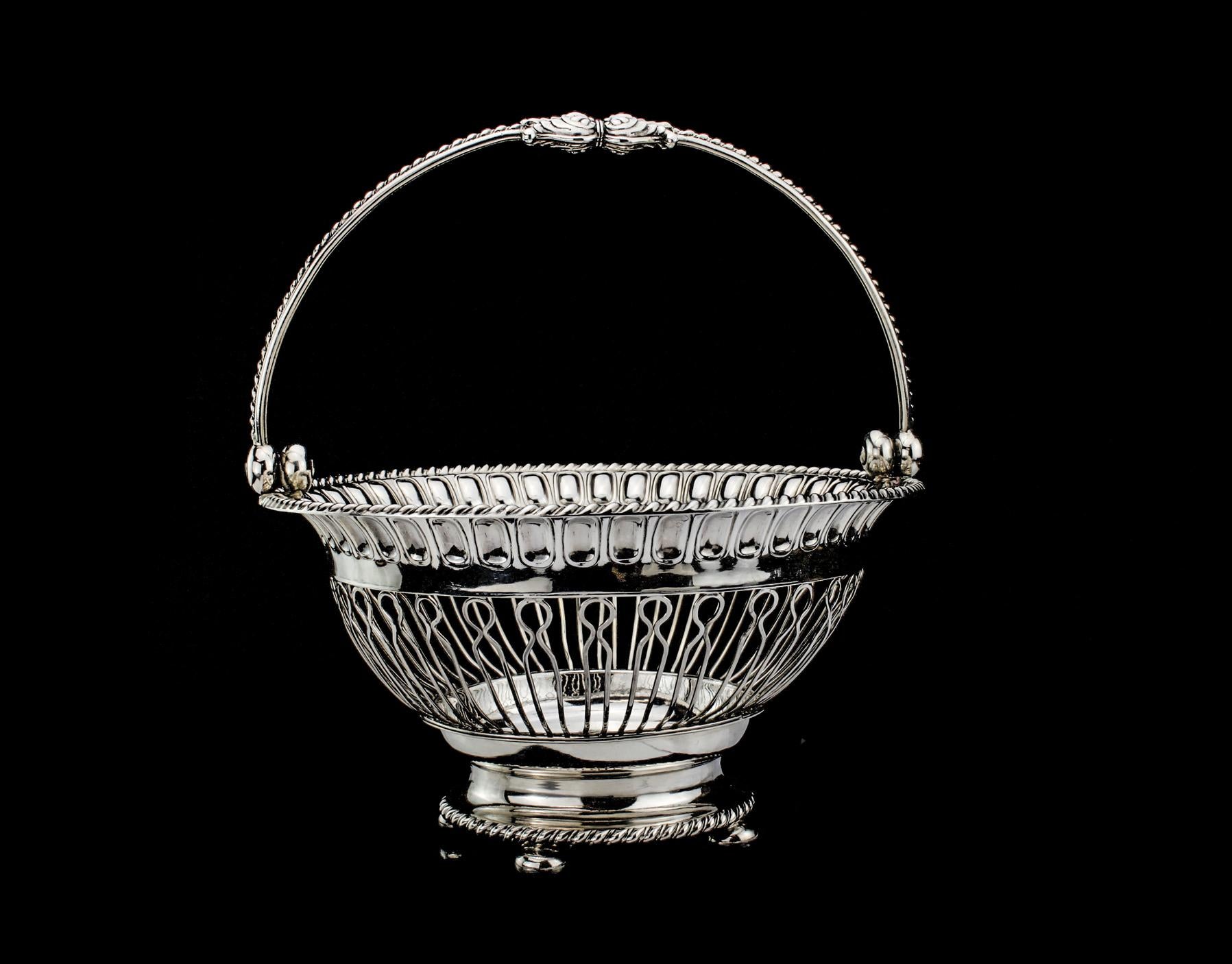 Antique Georgian fruit basket 
Maker: TW &Co. ( unidentified ) 
Made in England, Sheffield, 1812
Fully hallmarked.

Dimensions - 
Diameter x Height - 24 x 13 cm 

Weight: 800 grams

Condition: Minor wear from general usage, no damage,