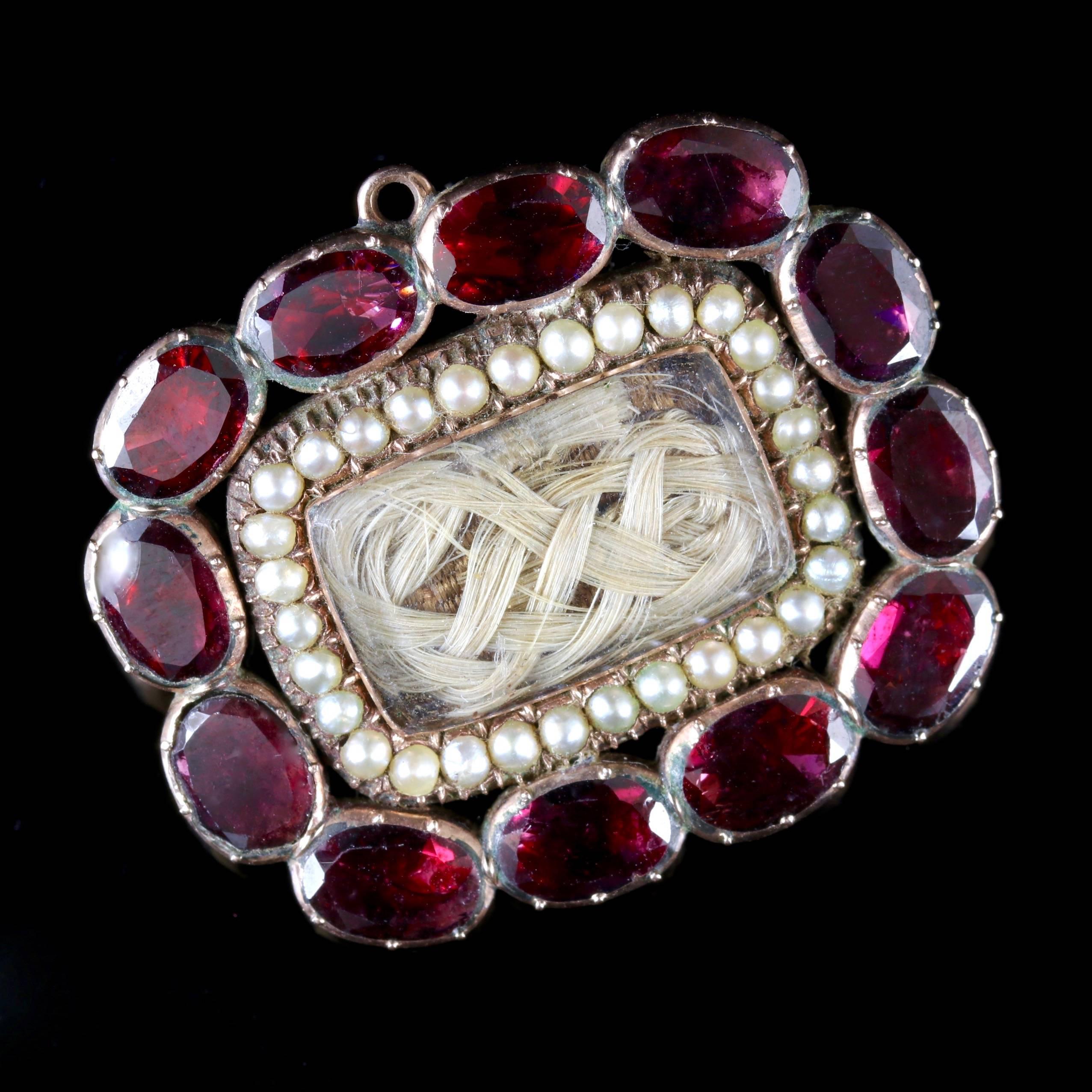 This Georgian 18ct Gold Flat cut Garnet mourning brooch is Circa 1800.

Due to its age, Georgian jewellery is quite rare, with some pieces almost three hundred years old. From 1714 until 1837 four King Georges and a short-lived William gave rise to