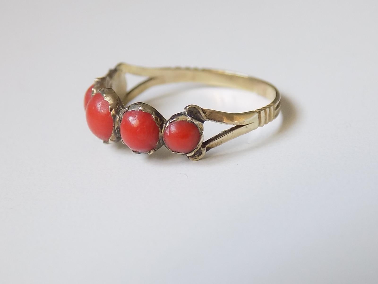 Lovely Georgian c.1800 Gold and Coral half eternity ring. English origin.
Size O UK, 7.5 US.
Height of the face 6mm.
Weight 1.4gr.
Unmarked.