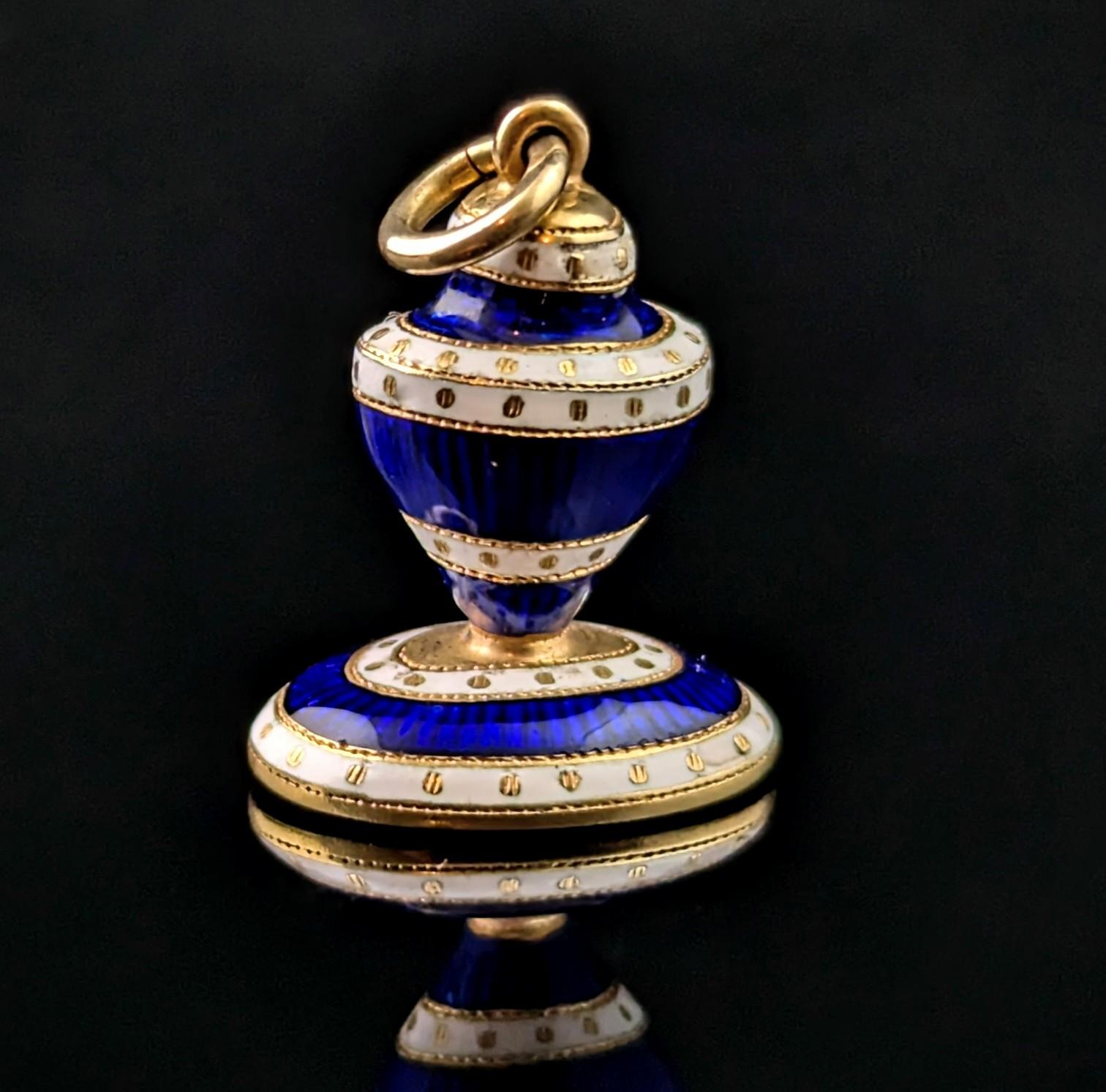 A wonderful and regal antique Georgian seal fob pendant.

It is designed as an urn, the urn usually found in sentimental or mourning jewellery in the Georgian era, often decorated with gemstones and enamels or created for woven hair.

It is made
