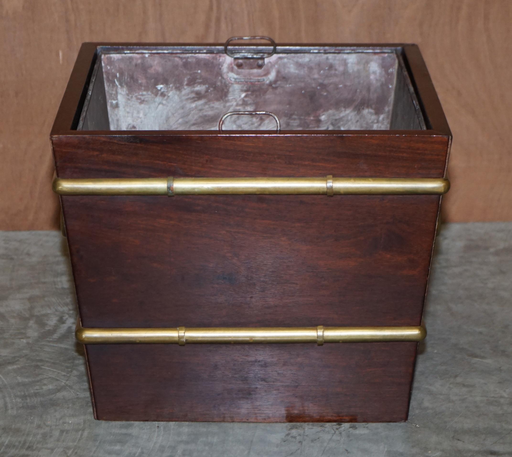 We are delighted to offer for sale this stunning Antique Georgian mahogany and thick solid brass wine bucket with period zinc liner

A very good looking and well made piece, it would make a wonderful log bin to sit next to a fire. The piece made