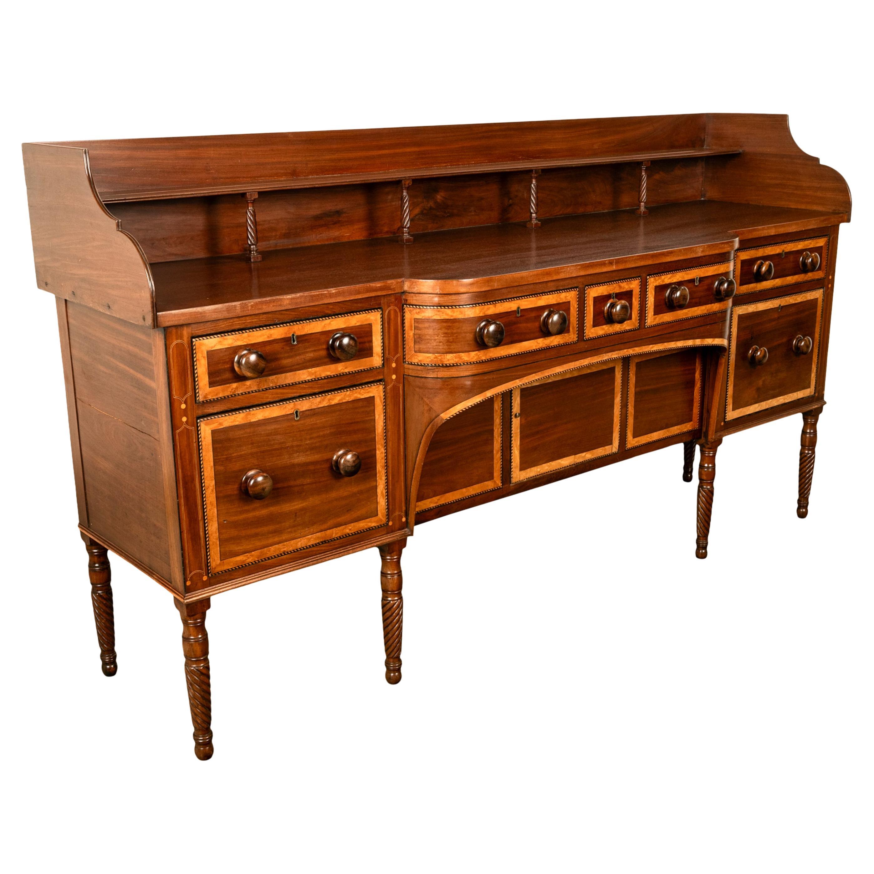 A fine antique Irish Georgian inlaid Cuban mahogany Country House sideboard, Donegal, circa 1800.
The sideboard came from a fine country house in Donegal and by repute from Buncrana Castle, the sideboard is of unusually large size at almost 7.5'
