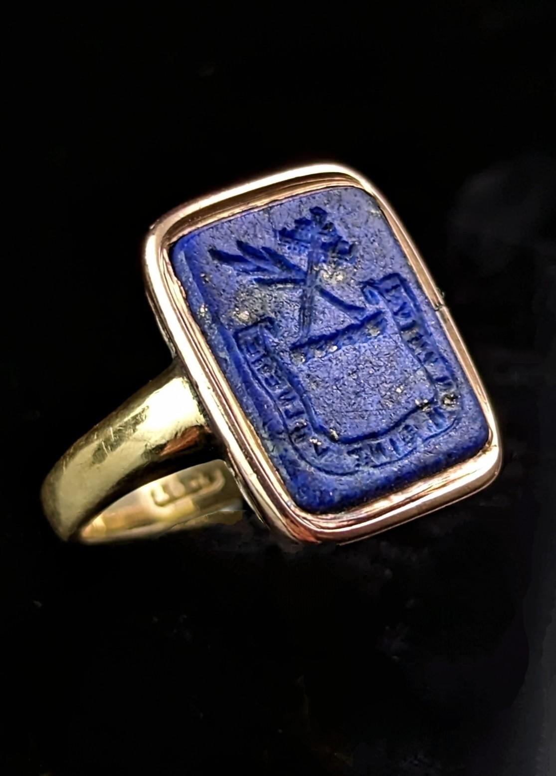 You can't help but be charmed by the history and mystery of this antique intaglio seal ring.

The ring is composed of a Lapis Lazuli Georgian era intaglio seal on a later antique 15ct gold shank.

The lapis Lazuli has lots of gold running through