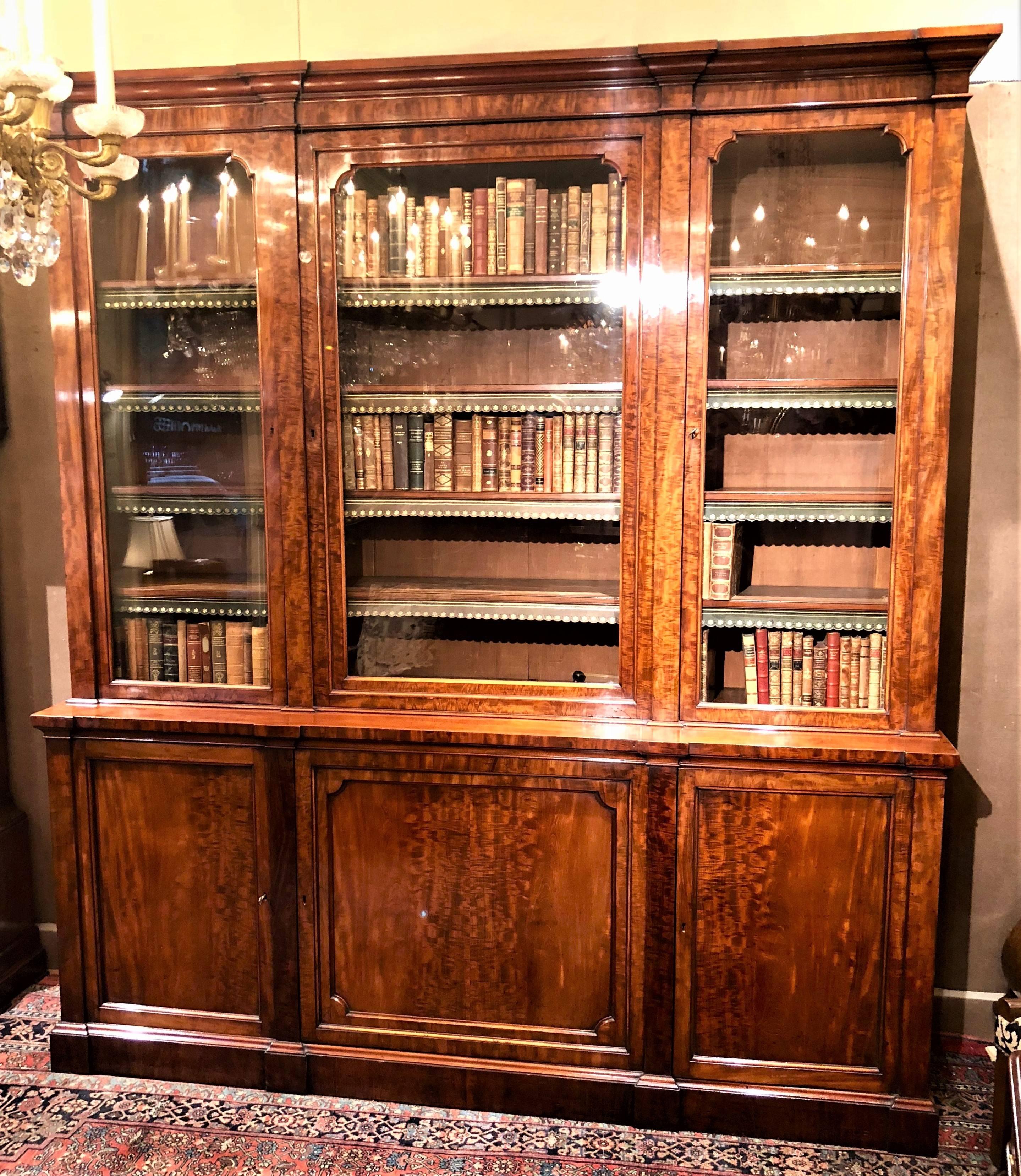 Antique Georgian mahogany breakfront bookcase, circa 1830.