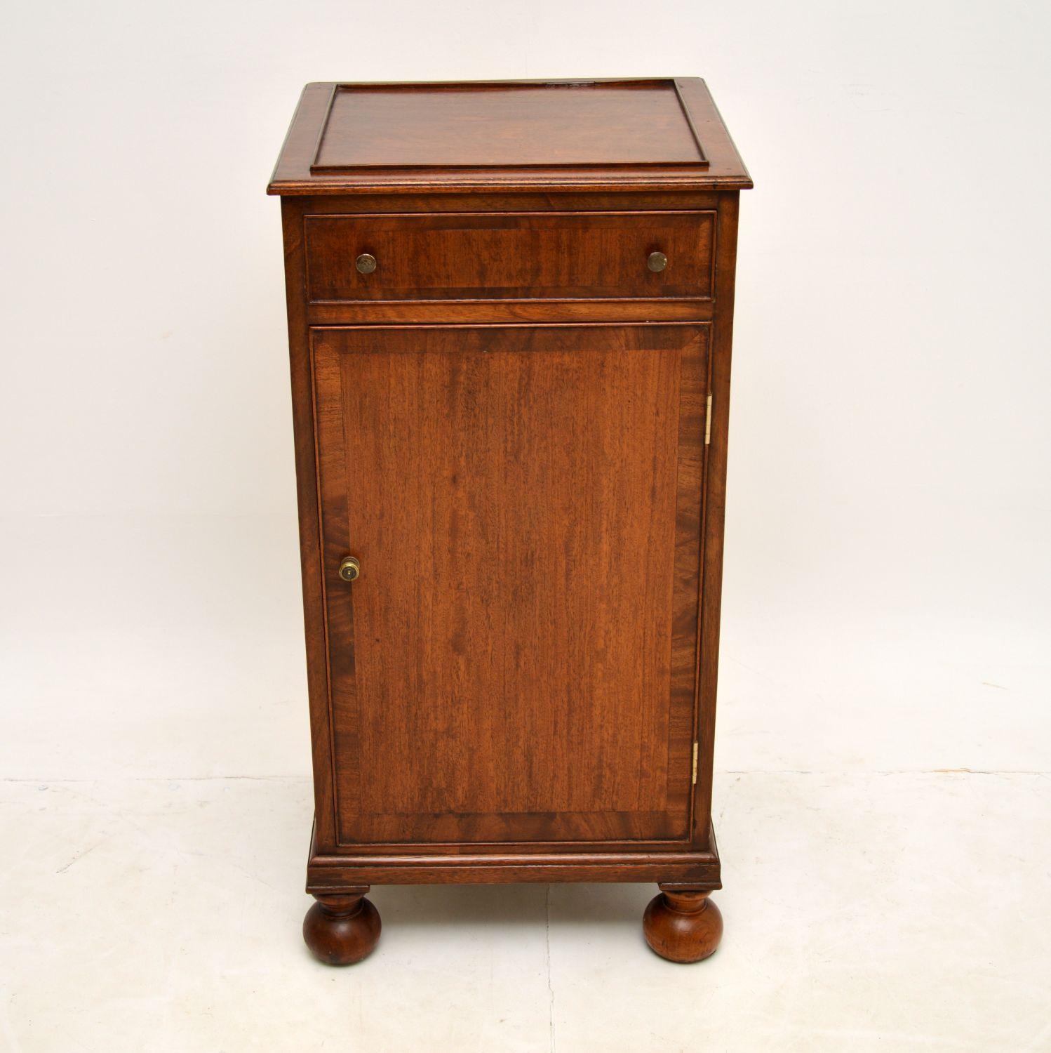 A wonderful antique Victorian cabinet. This was made in England & dates from around the 1850’s period.

The quality is fantastic, this is really well made from solid wood with some wooden cross banding. The original brass handles are also of fine