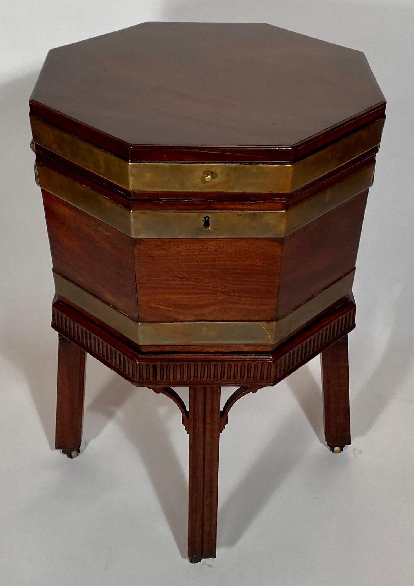 Antique Georgian mahogany cellarette, circa 1840. Used to store spirits - wine or whiskey- until they were used at a festive occasion.
 