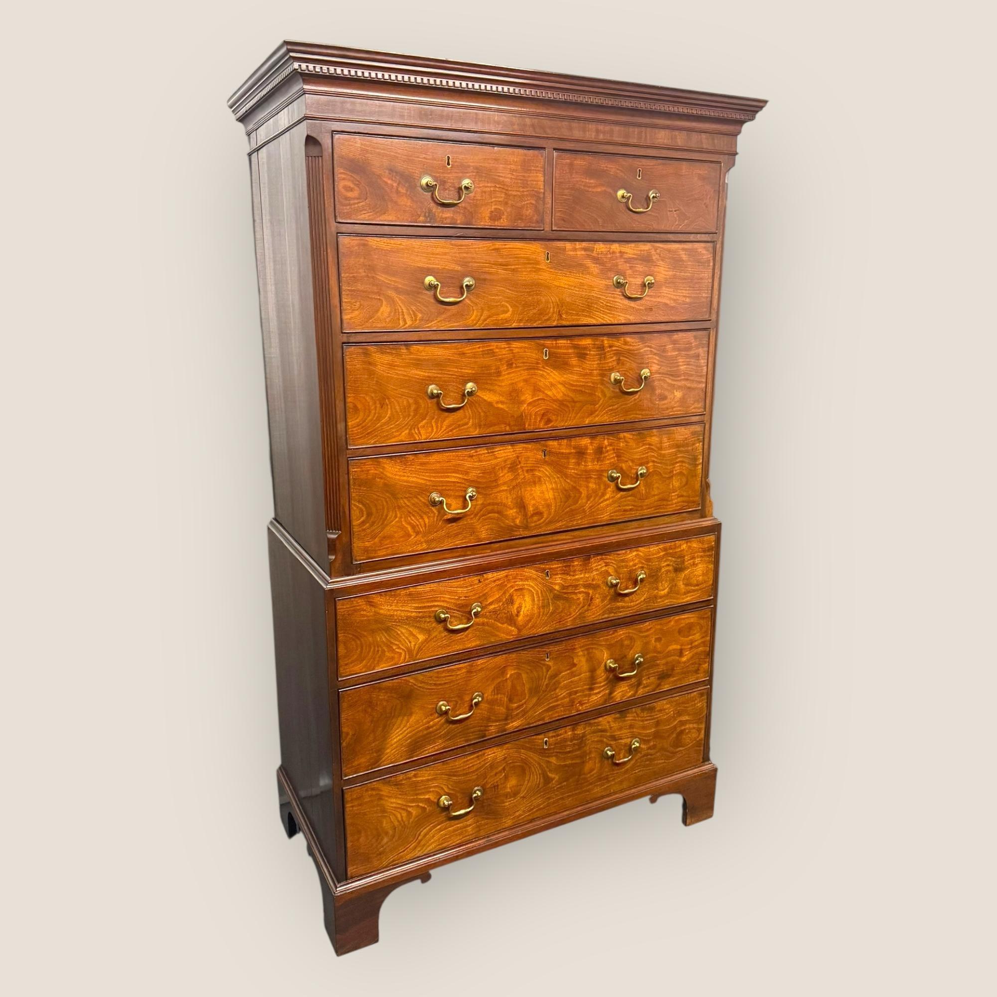 Here we have an Antique Georgian, George III (1760-1820), Mahogany Chest On Chest with 6 large drawers and 2 smaller drawers to the top. The top features a moulded dentil cornice, each drawer has brass handles, and the chest on chest stands on