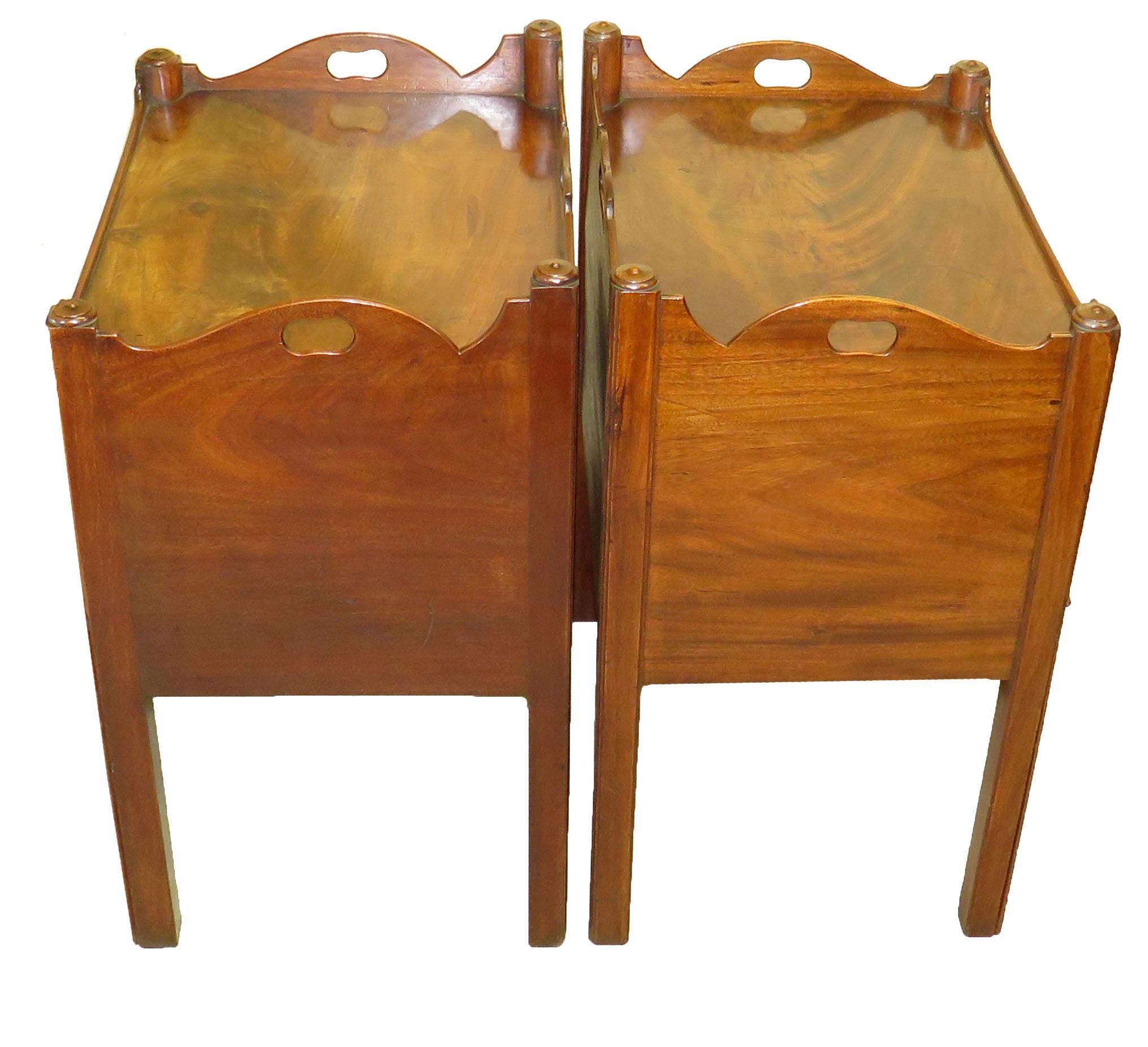 A very well matched pair of 18th century mahogany bedside night
tables, or tray top commodes, having superbly figured tops
with shaped galleries above up and over doors and converted
drawers raised on elegant square chamfered legs.

(These are