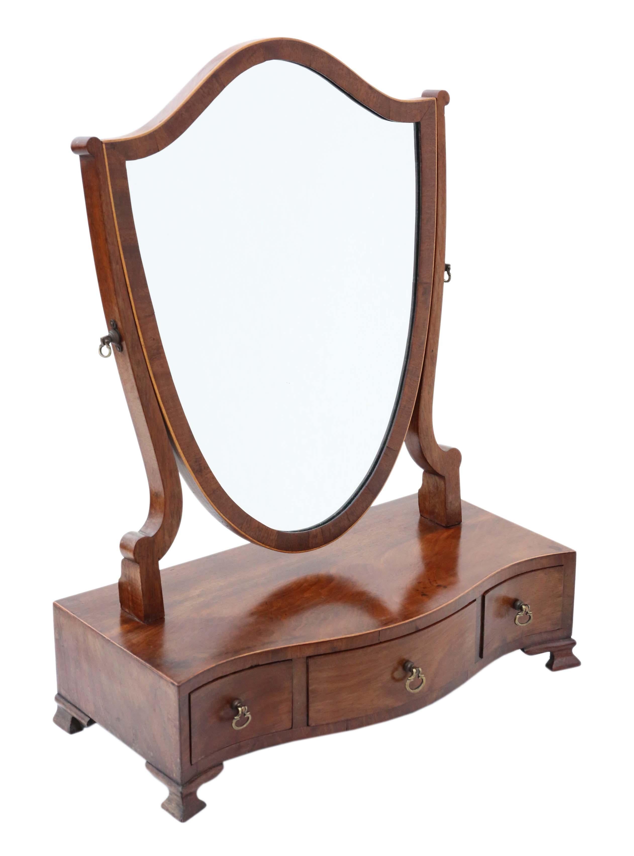 Antique quality Georgian C1810 mahogany serpentine shield dressing table swing mirror.

This is a lovely mirror, that is full of age and charm, with great proportions.

No loose joints.

A rare find, that would look amazing in the right