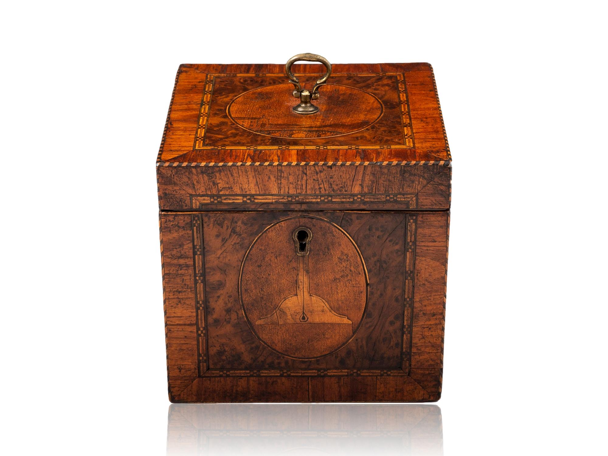 Featuring Masonic Scenes

From our Tea Caddy collection, we are delighted to offer this extremely rare Georgian Masonic Tea caddy. The Tea Caddy of box form with chequered edging and borders of Tulipwood surrounding Burr Yew wood squares each