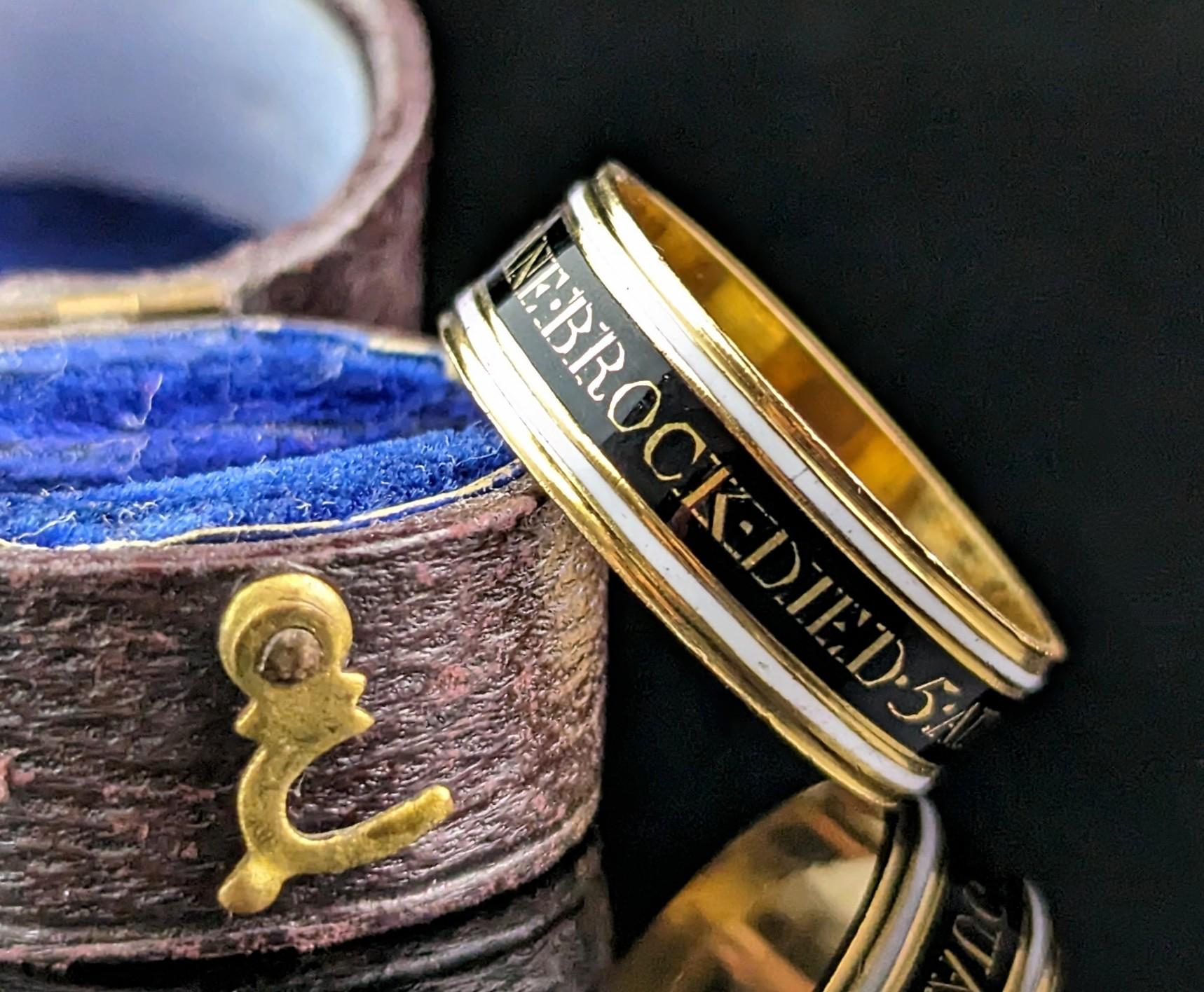 You cannot help but be enchanted by the beauty and emotion of this stunning antique Georgian mourning band ring.

The ring is a very rich 22kt yellow gold, enamelled in black with white enamel bands top and bottom.

The words picked out in gold tell