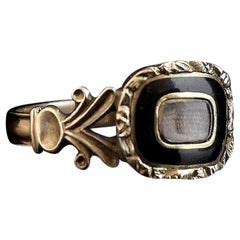 Antique Georgian Mourning Ring, 12 Karat Gold, Black Enamel and Hairwork