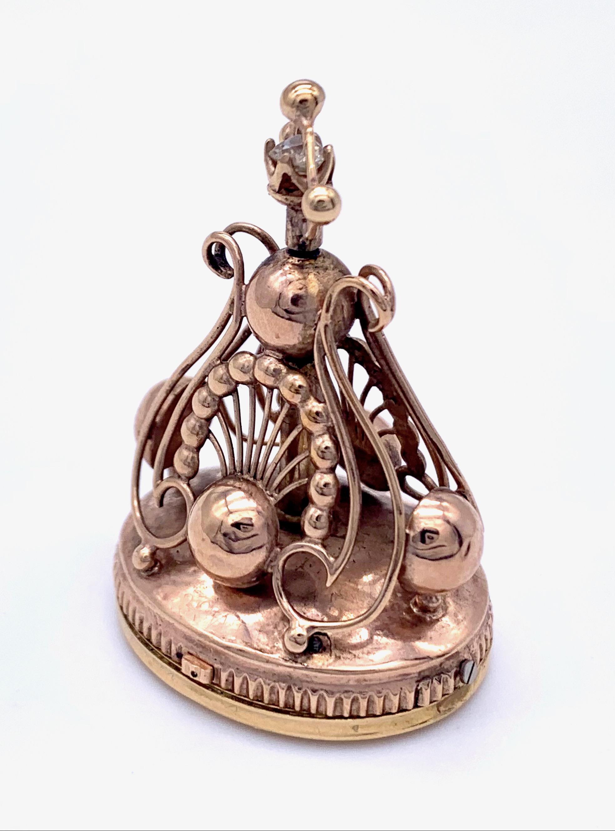 This highly unusual musical pendant was originally worn on a gentlemen's watchchain as an extraordinary curiosity. It is in full working order and plays a little tune. The top of this rare jewel is embellished with a diamond.
