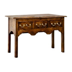 Antique Georgian Oak Lowboy with scalloped apron, late 18th / early 19th century