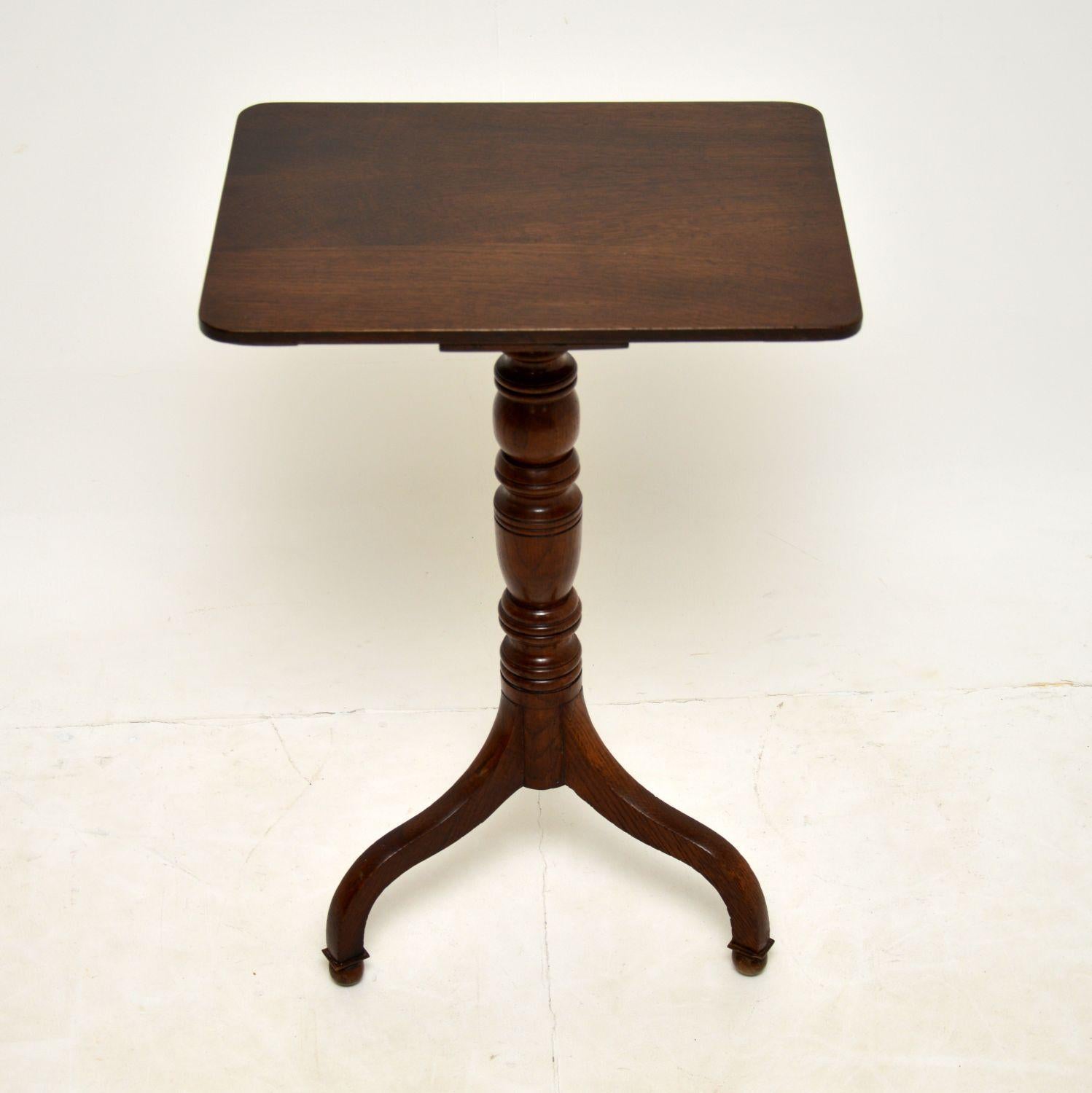 A wonderful antique Georgian period side table, dating from around the 1790’s period.

It is very well made from solid oak, which has a lovely colour and patina. The size is very useful, this is stable and sturdy.

The column is beautifully