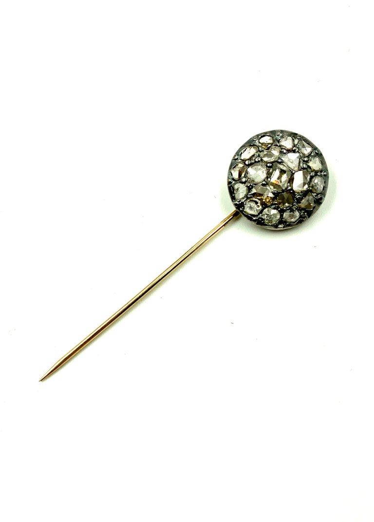 Large beautifully made antique old mine diamond tie/lapel pin featuring nineteen diamonds set in a circular pattern with the center diamond surrounded by a circle of six diamonds which are surrounded by another circle of twelve diamonds. The center