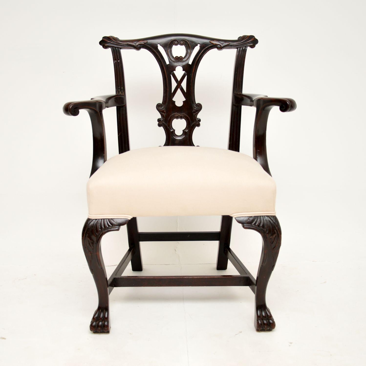 An excellent Georgian period armchair in the Chippendale style. This very fine example was made in England, it dates from around 1760-80’s period.

It is of absolutely fabulous quality, with a very bold and beautifully carved frame. It has a wide