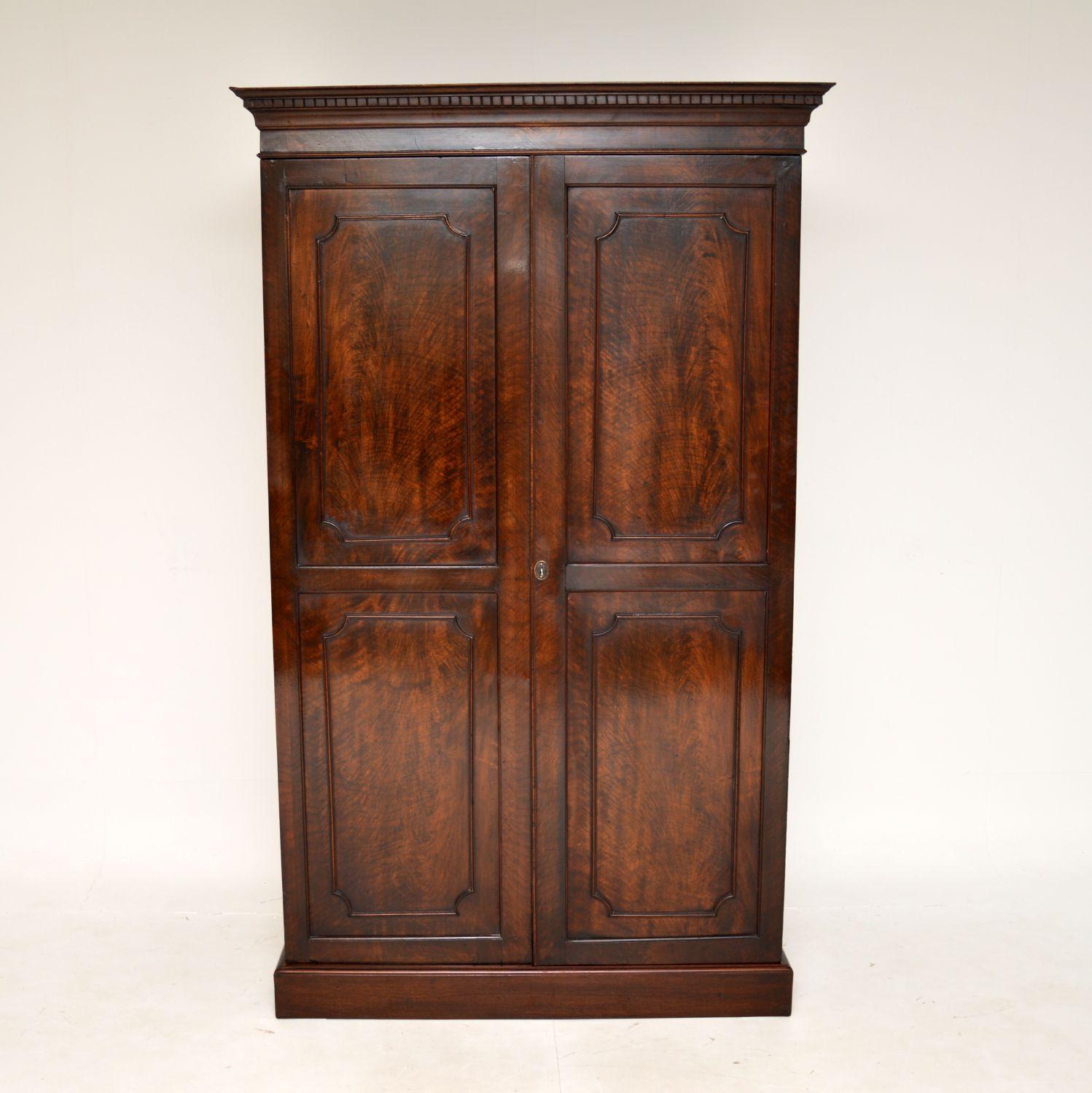 A fantastic original Edwardian period hall cupboard. This was made in England, and it dates from around the 1890-1900 period.

It is of amazing quality and is a very useful size. Ideal for use in an entry way, there is a hanging rail that runs