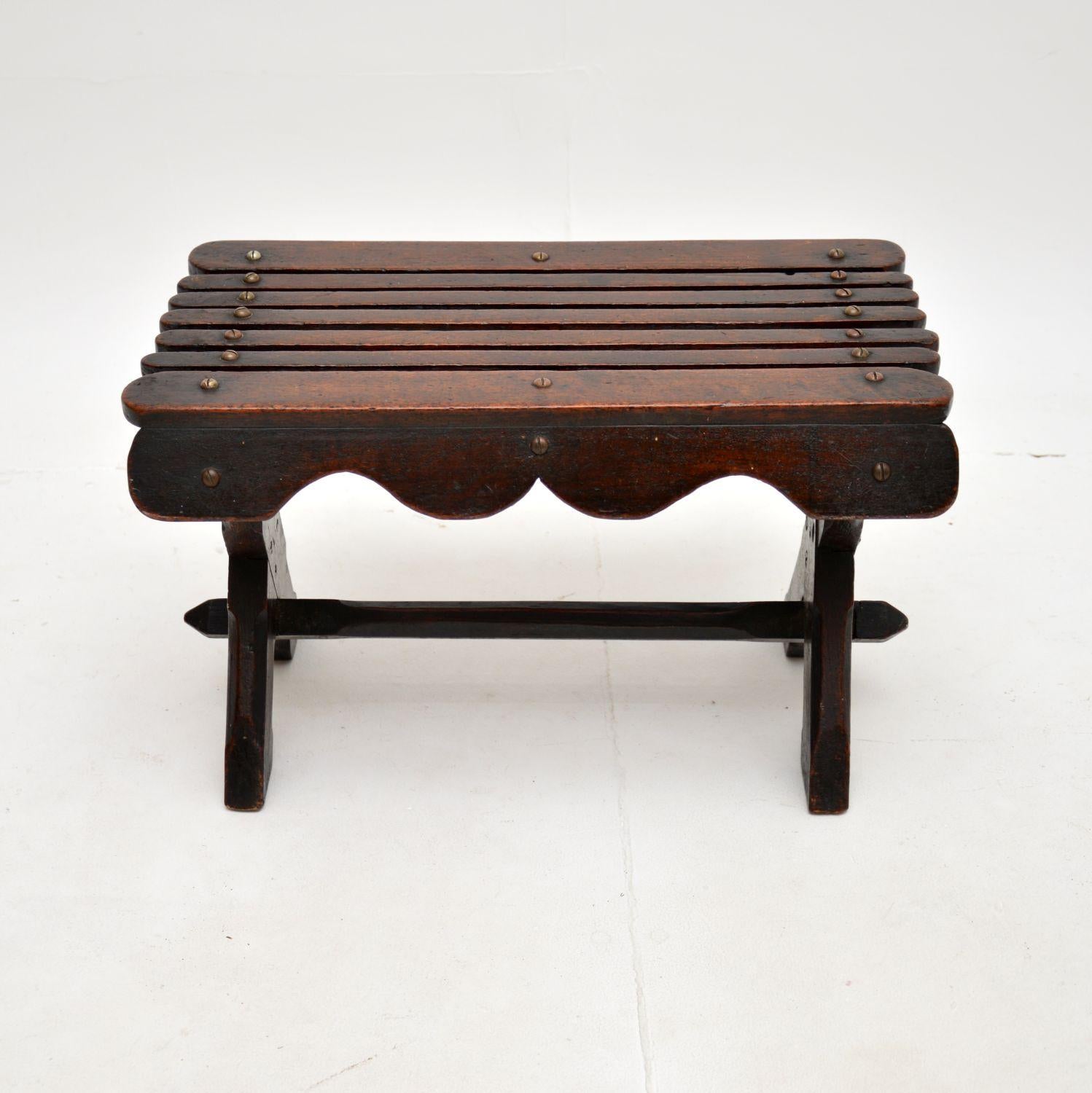 A charming and very unusual Georgian period X frame side table, which could also be used as a stool. This was made in England, we would date it from around the 1860’s period & it’s very much Gothic style.

It is very small and also very well made