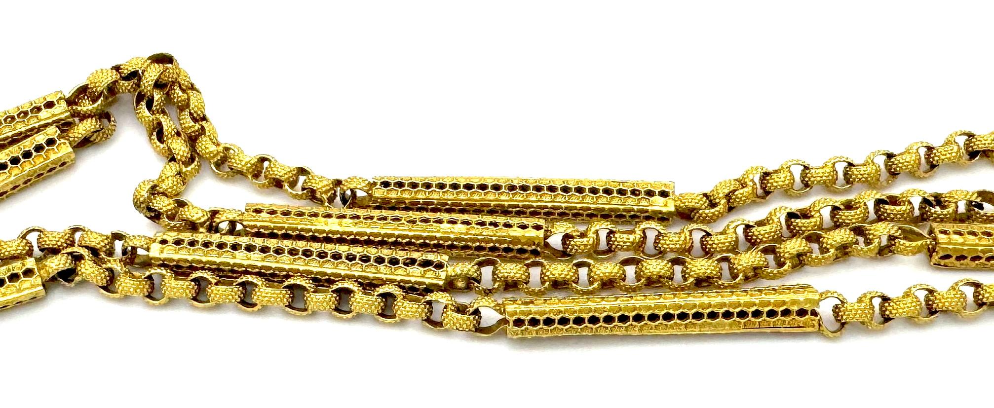 This Pinchbeck long guard chain was created in 1825 ca. The snake head was a popular feature of the period representing eternity in love and friendship. The material Pinchbeck was the invention of the London watch- and clockmaker Christopher