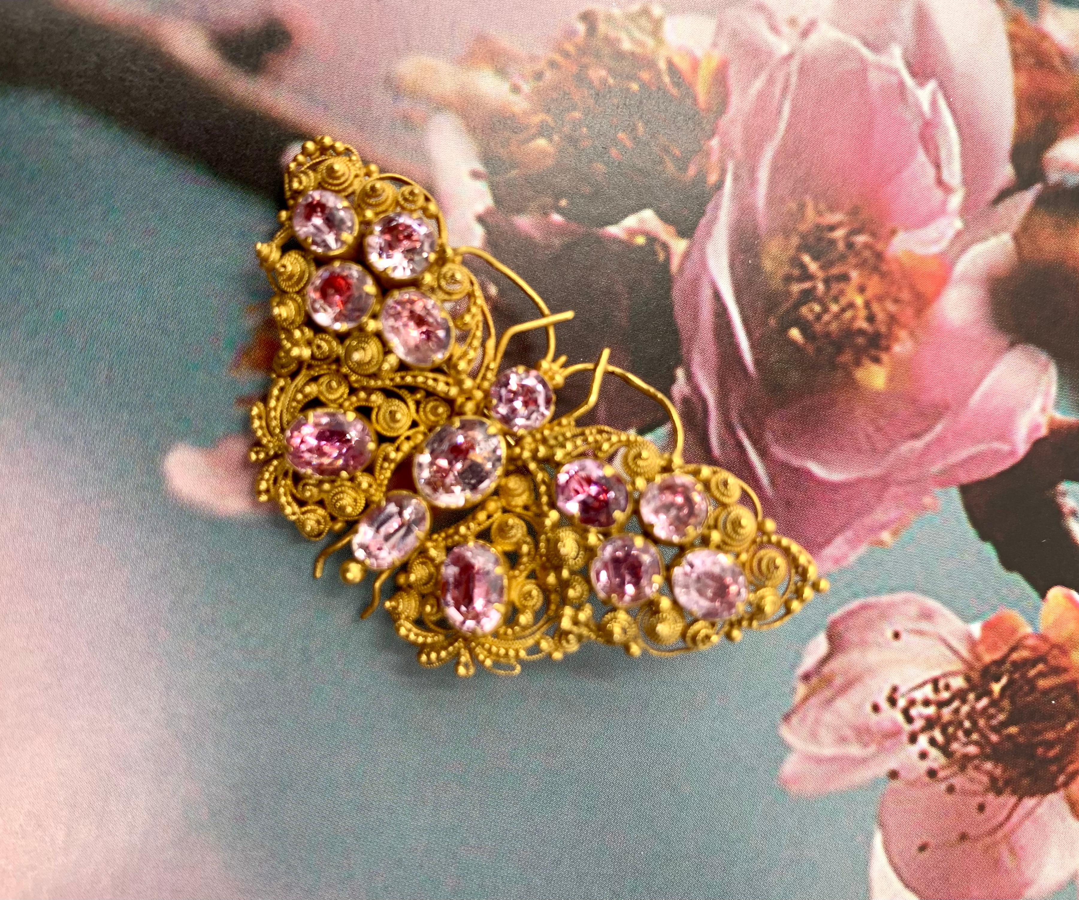 Antique Cannetille jewelry is highly admired for its exquisitely detailed hand wrought gold work reputedly inspired by fine lace embroidery of the 18th century. The romantic aethetic of Cannetille jewels celebrates the beauty of nature in the