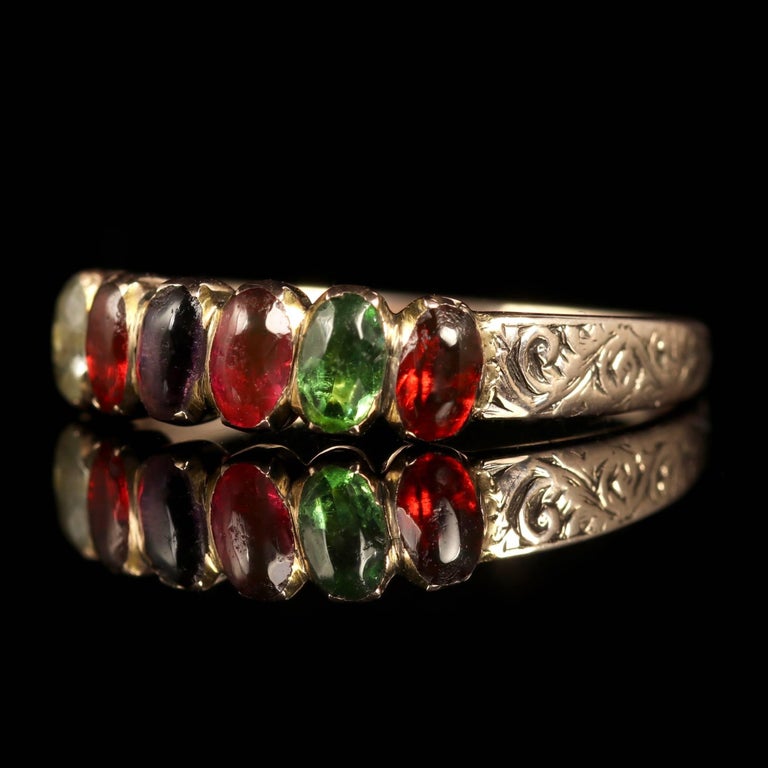 This fabulous REGARD 18ct Gold Georgian ring is adorned with beautiful gemstones which are all Cabochon cuts, such as Ruby, Emerald, Garnet, Amethyst and Diamond, Circa 1790.

Originally from the 18th Century this is a very rare find indeed.

The
