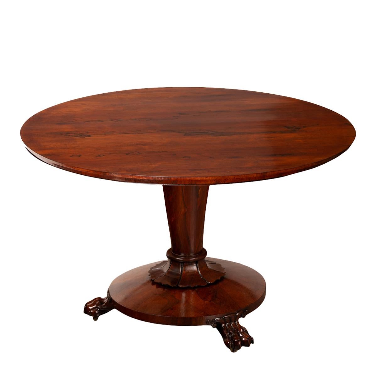 A very good example of an antique Georgian, Regency period, tilt-top rosewood dining/breakfast, circa 1820.
The table is made of the finest figured rosewood, the circular top locking into the pedestal base with the original brass locking mechanism