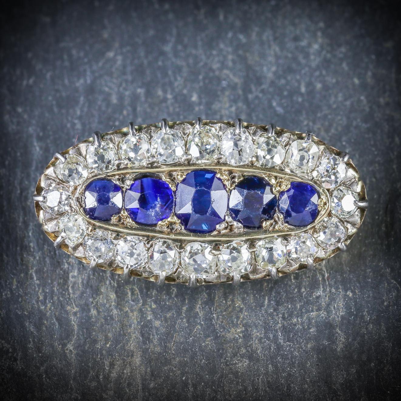 A stunning antique Sapphire and Diamond brooch from the Georgian era, Circa 1800

The wonderful oval gallery displays five deep blue Sapphires making up 1.3cts in total

A halo of sparkling old cut Diamonds borders the brooch with a total of 1.5cts