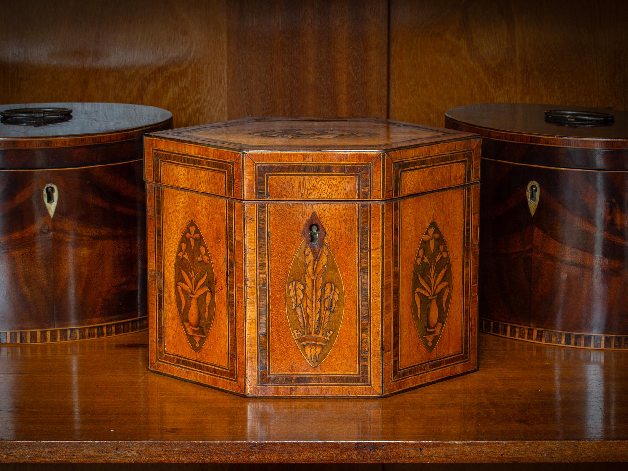 Prince of Wales Feathers

From our Tea Caddy collection, we are delighted to offer this Antique Satinwood Tea Caddy. The Tea Caddy of elongated hexagonal form edged in Ebony with delicately inlaid panels featuring the Prince of Wales feathers to the
