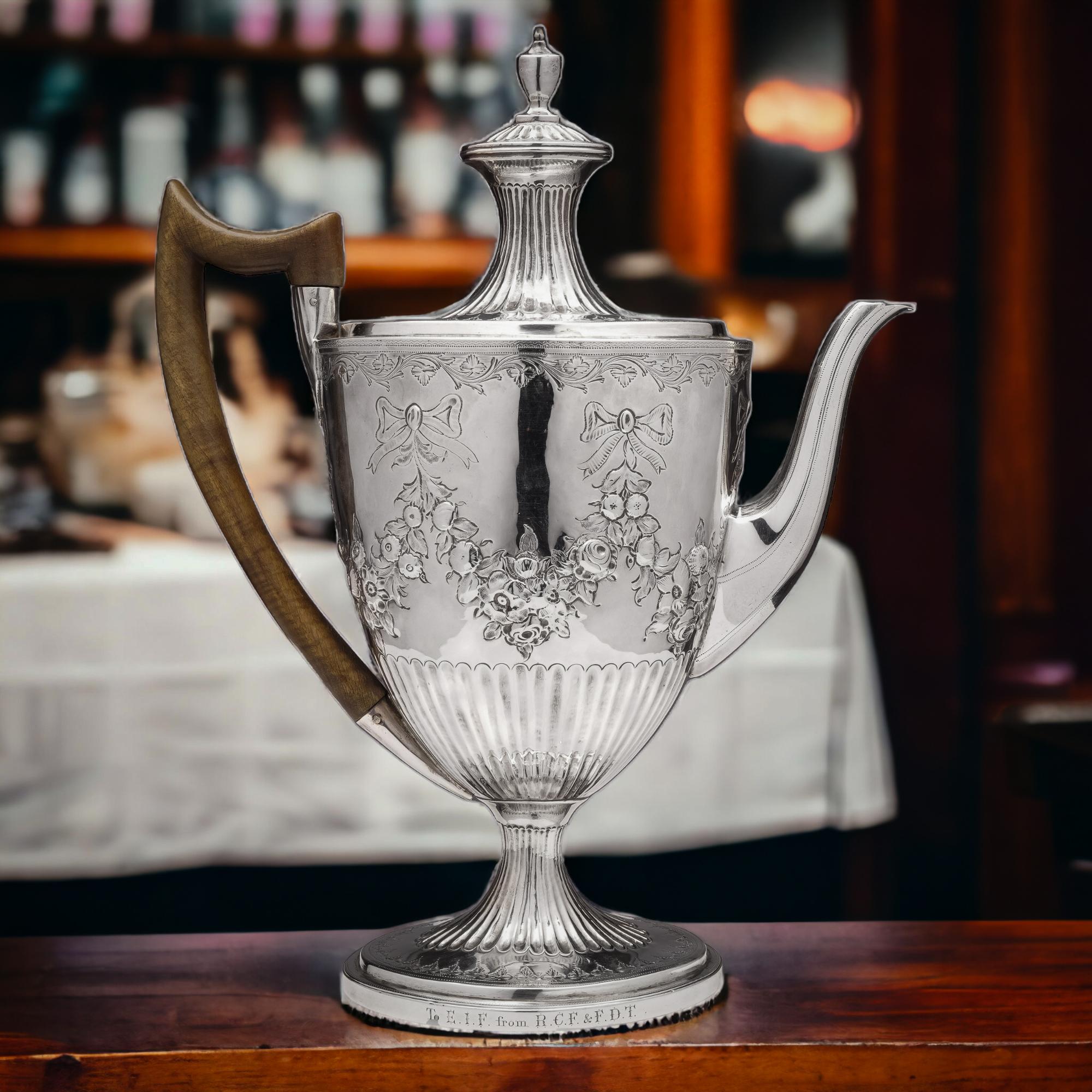 Exquisite Antique Georgian Silver Coffee Pot, London 1832, by John Reily

A truly captivating piece, this coffee pot bears the initials on its round base: 