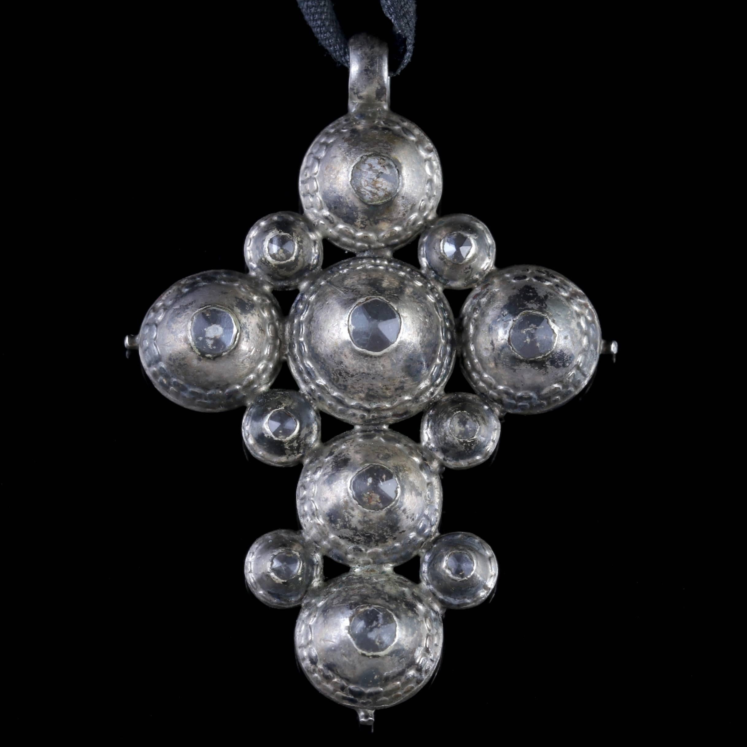 To read more please click continue reading below-

This stunning antique Georgian Silver Cross Necklace is Circa 1730. 

Due to its age, Georgian jewellery is quite rare, with some pieces almost three hundred years old. From 1714 until 1837 four