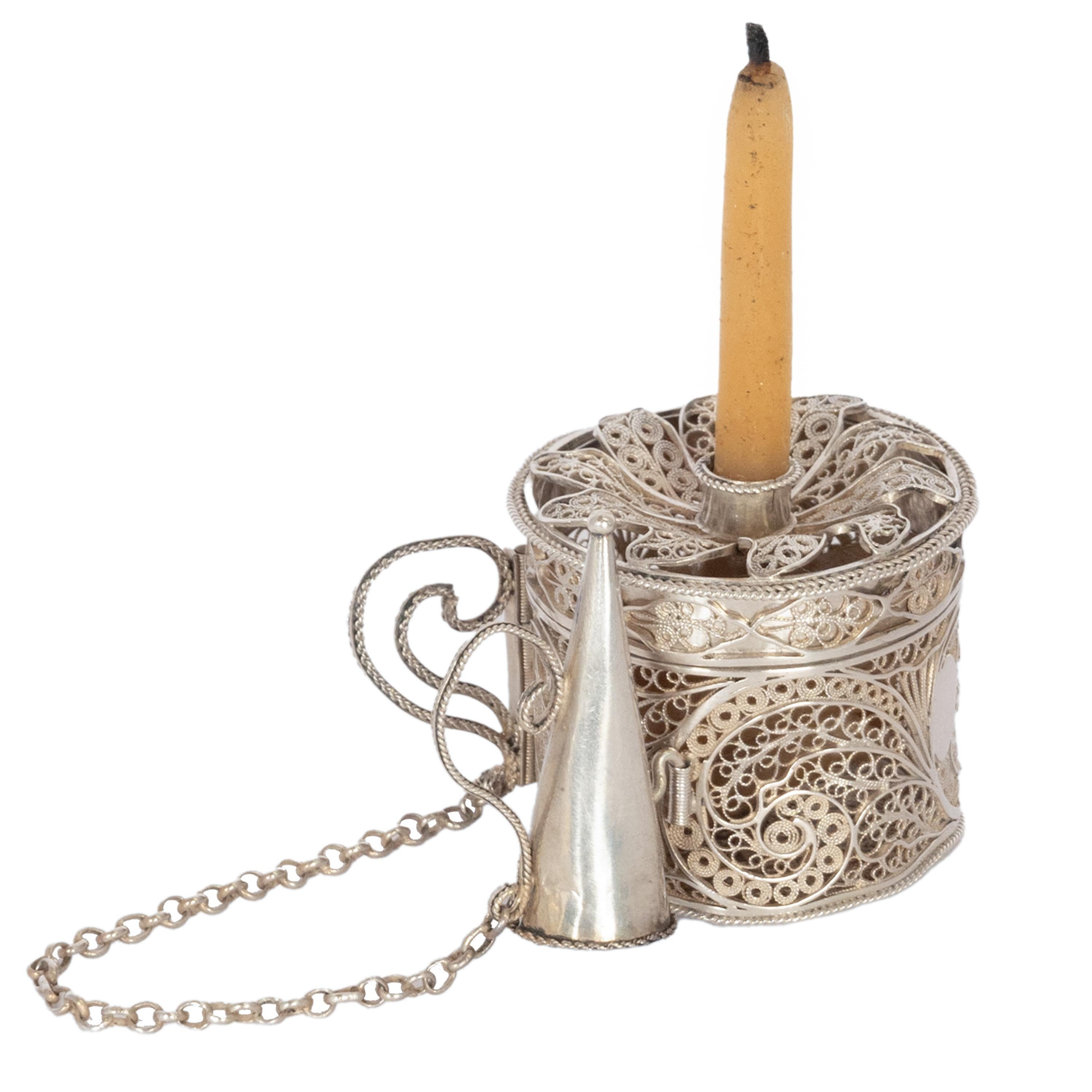 An rare Georgian sterling silver filigree bougie box, chamberstick, circa 1780. 
A 