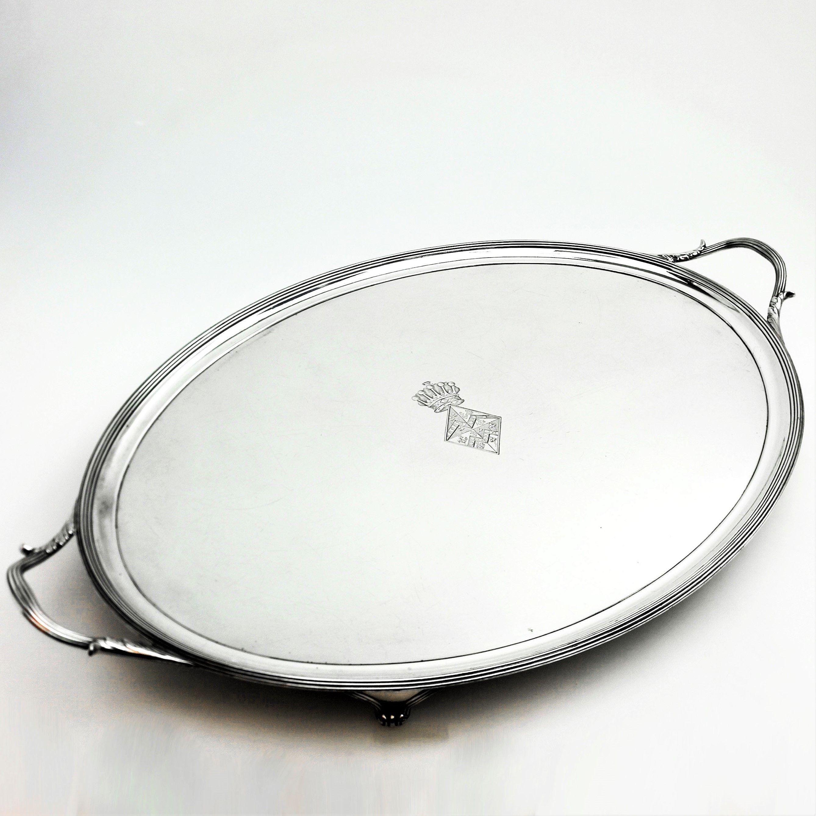 A magnificent antique George III large solid silver tray with an oval form and two handles. The tray has a crest engraved in the middle.
 
Made in London in 1800 by Hannam & Crouch.
 
Approx. Weight 115.5oz / 3594g
Measures: Approx. length